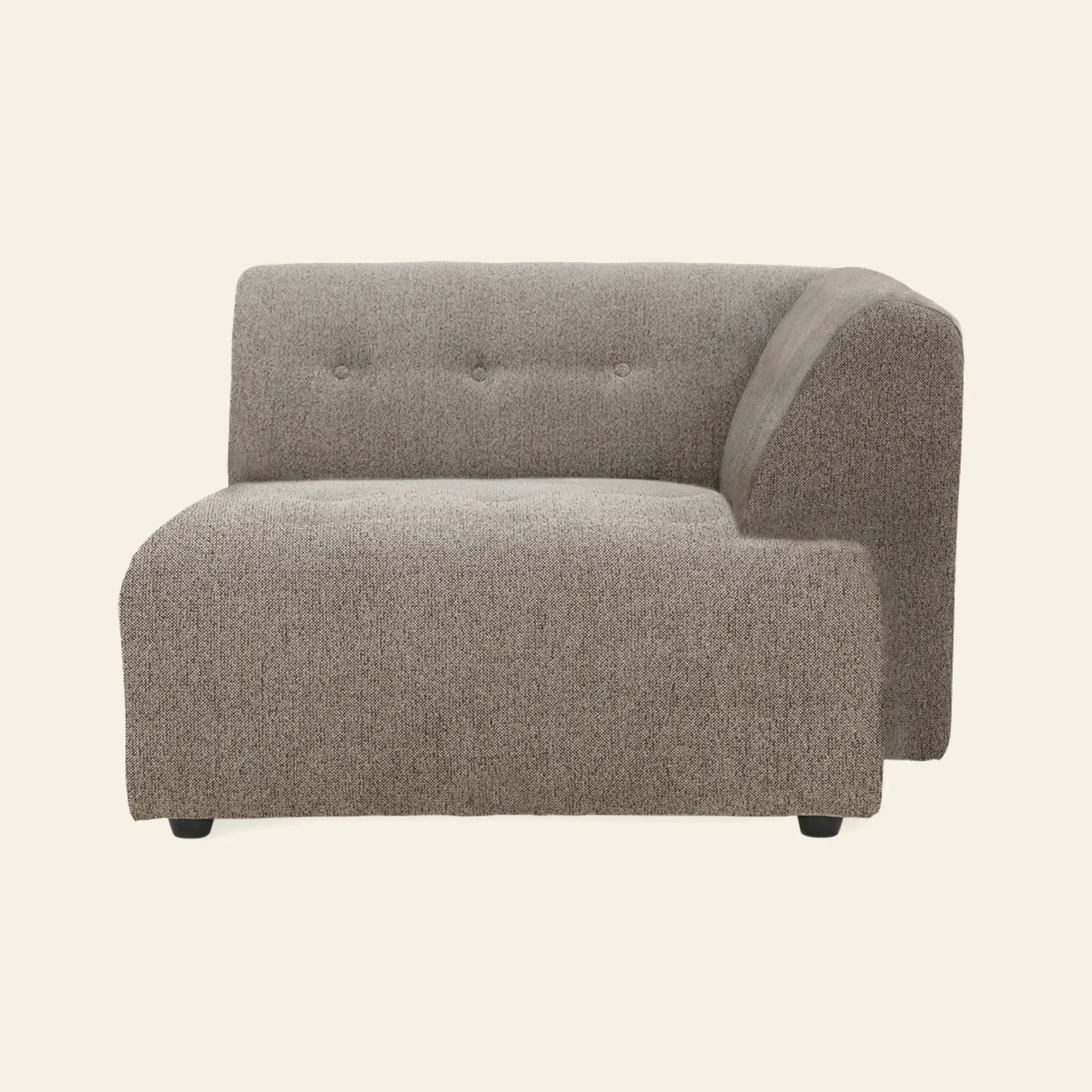 The HKliving Vint Couch, Right Divan by HKliving is a modern, armless sofa section in textured gray fabric with a low back, tufted buttons, and a right-side angled armrest—perfect for customizing your space. Shown on an off-white background.