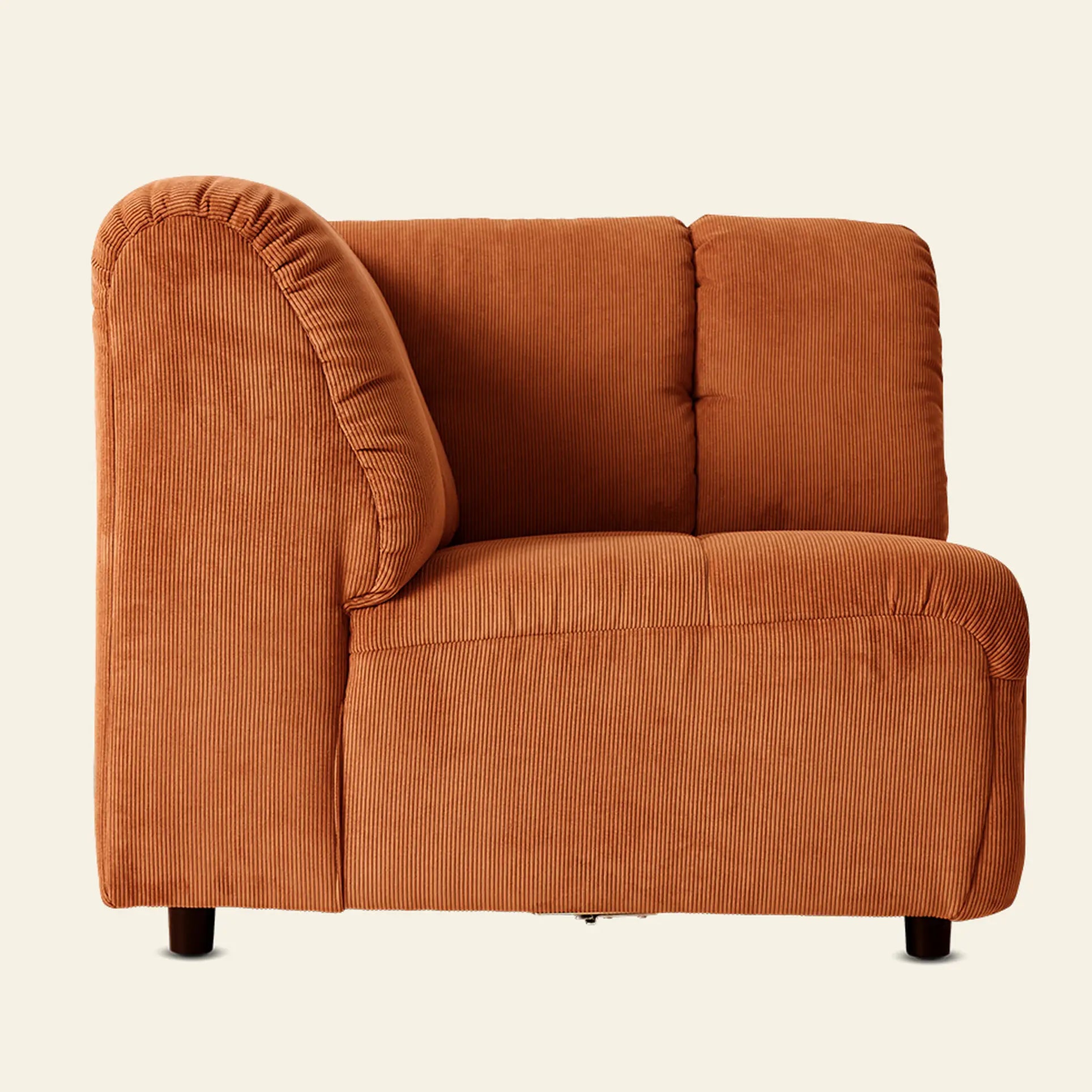The HKliving Wave Couch, Corner by HKliving is a modern, customizable armless section upholstered in textured burnt orange fabric with short dark wooden legs—ideal for refreshing your living room décor.