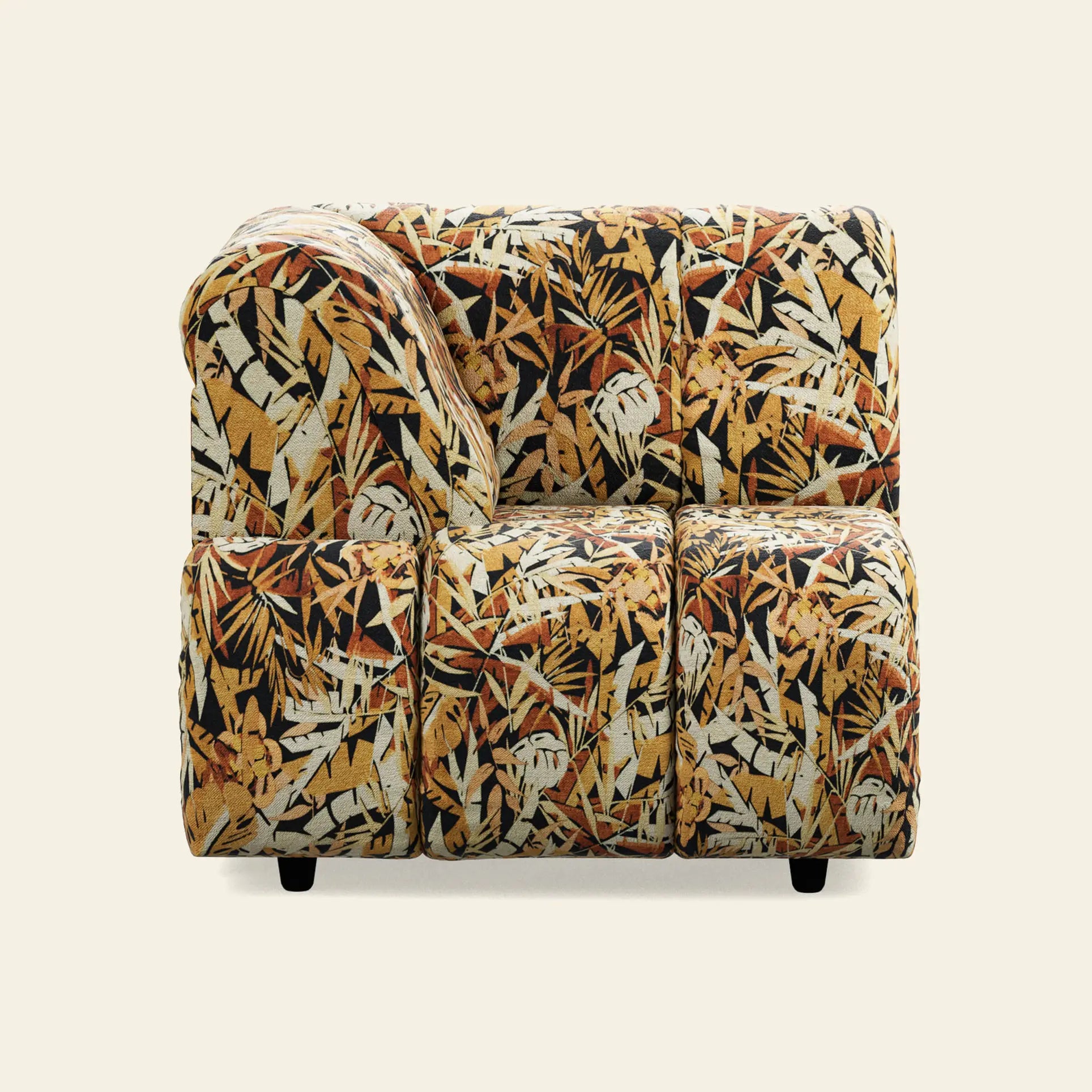 The HKliving Wave Couch, Left High Arm by HKliving features a bold jungle print in yellow, orange, brown, and black on a light base, pictured against a simple light-colored backdrop.