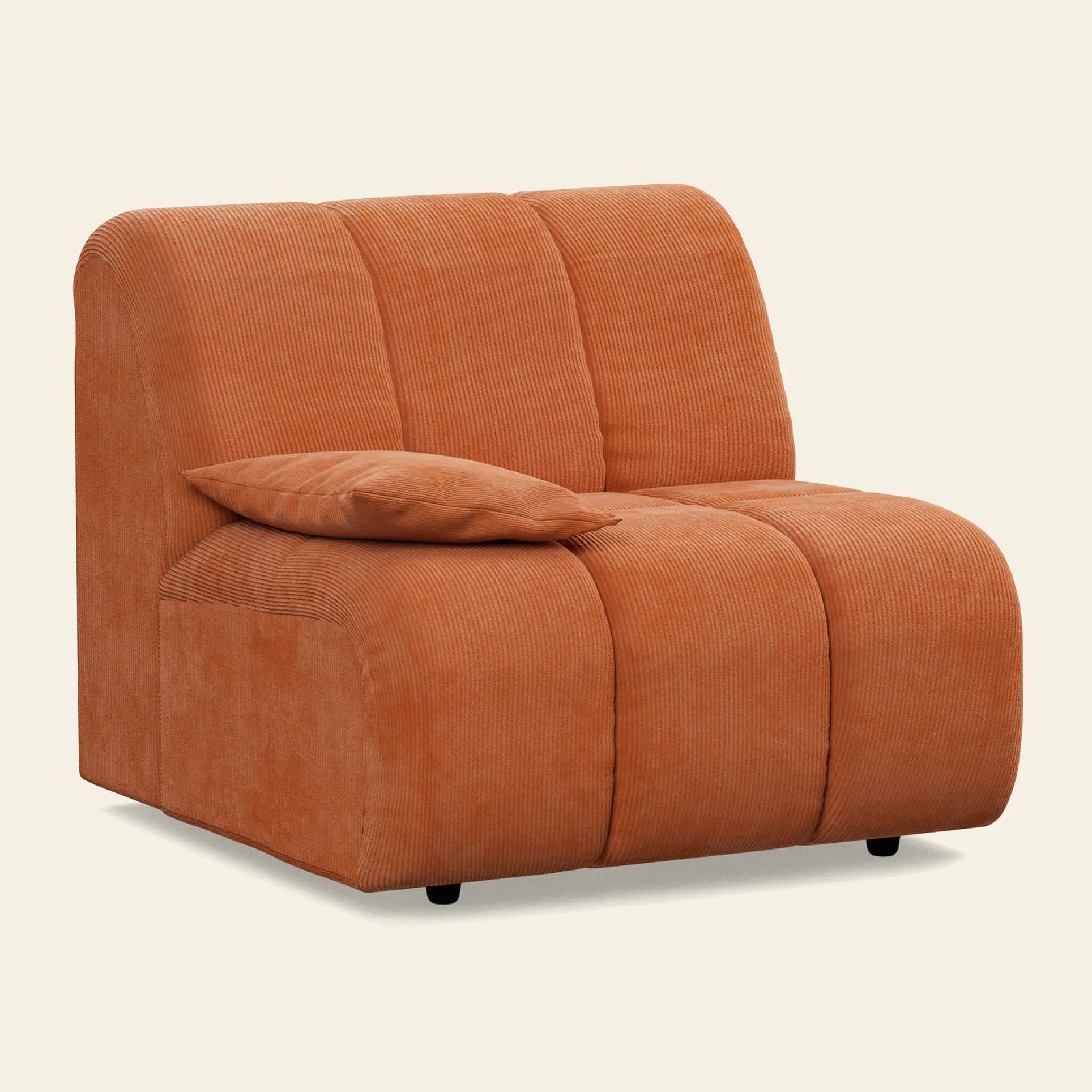 The HKliving Wave Couch, Left Low Arm by HKliving features burnt orange corduroy fabric and a matching pillow—an armless, modern lounge chair ideal for adding warmth to your living room, shown against a plain light background.