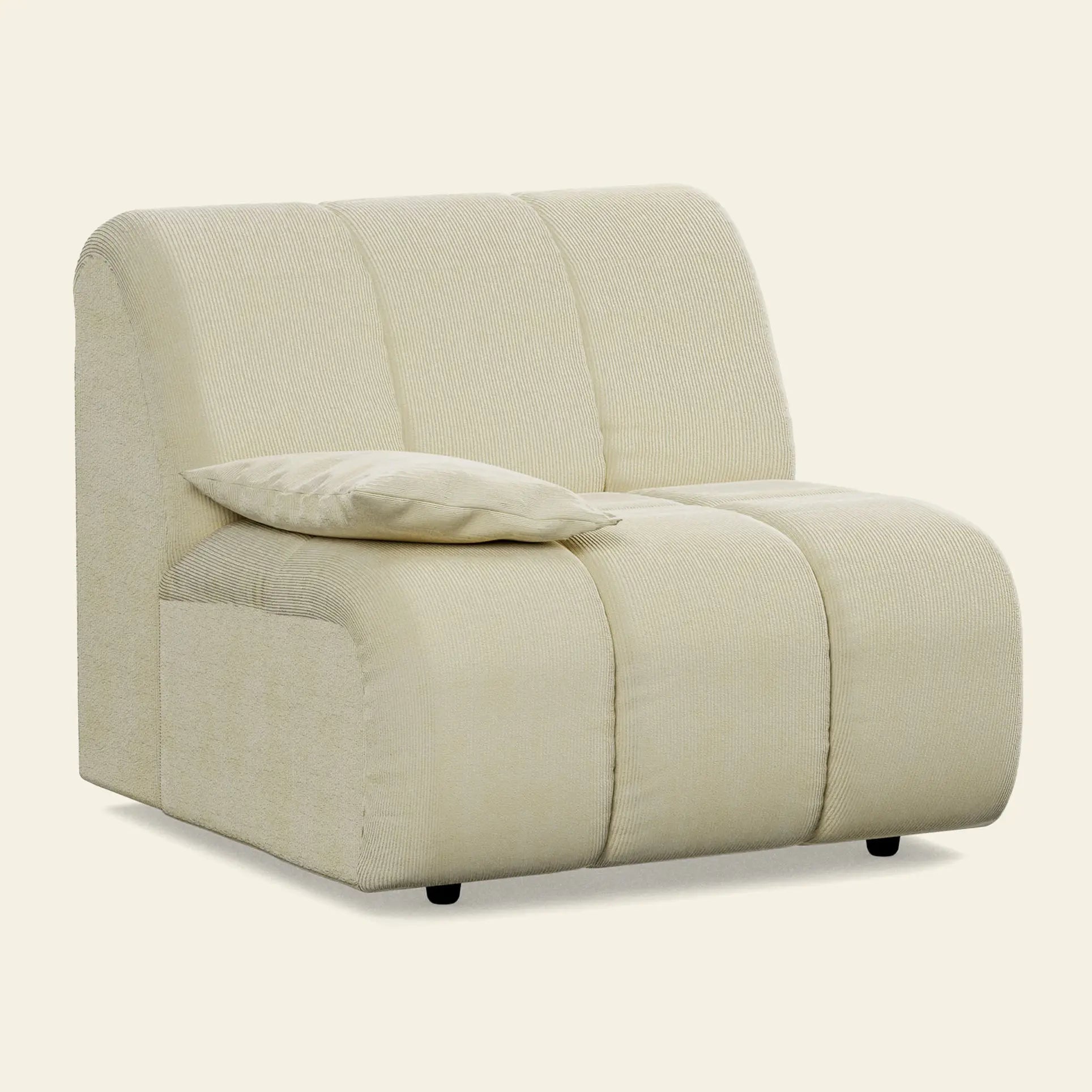 The HKliving Wave Couch, Left Low Arm by HKliving is a modern armless lounge chair in light beige fabric with a matching rectangular pillow, ideal for any living room and shown against a plain off-white background.
