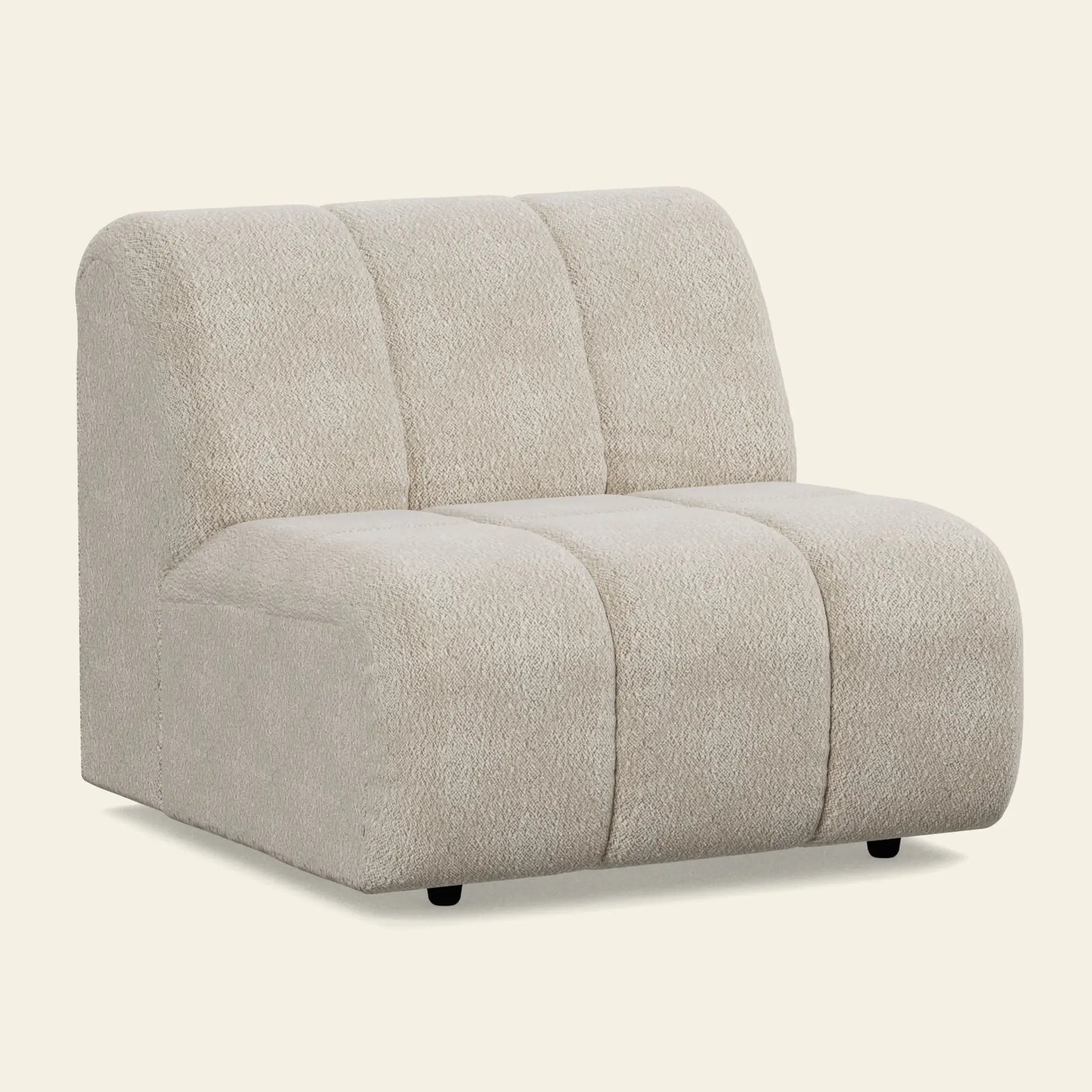 The HKliving Wave Couch, Middle by HKliving features a modern armless design with textured light beige upholstery and rounded 1970s-inspired cushioning, shown against a plain off-white background.
