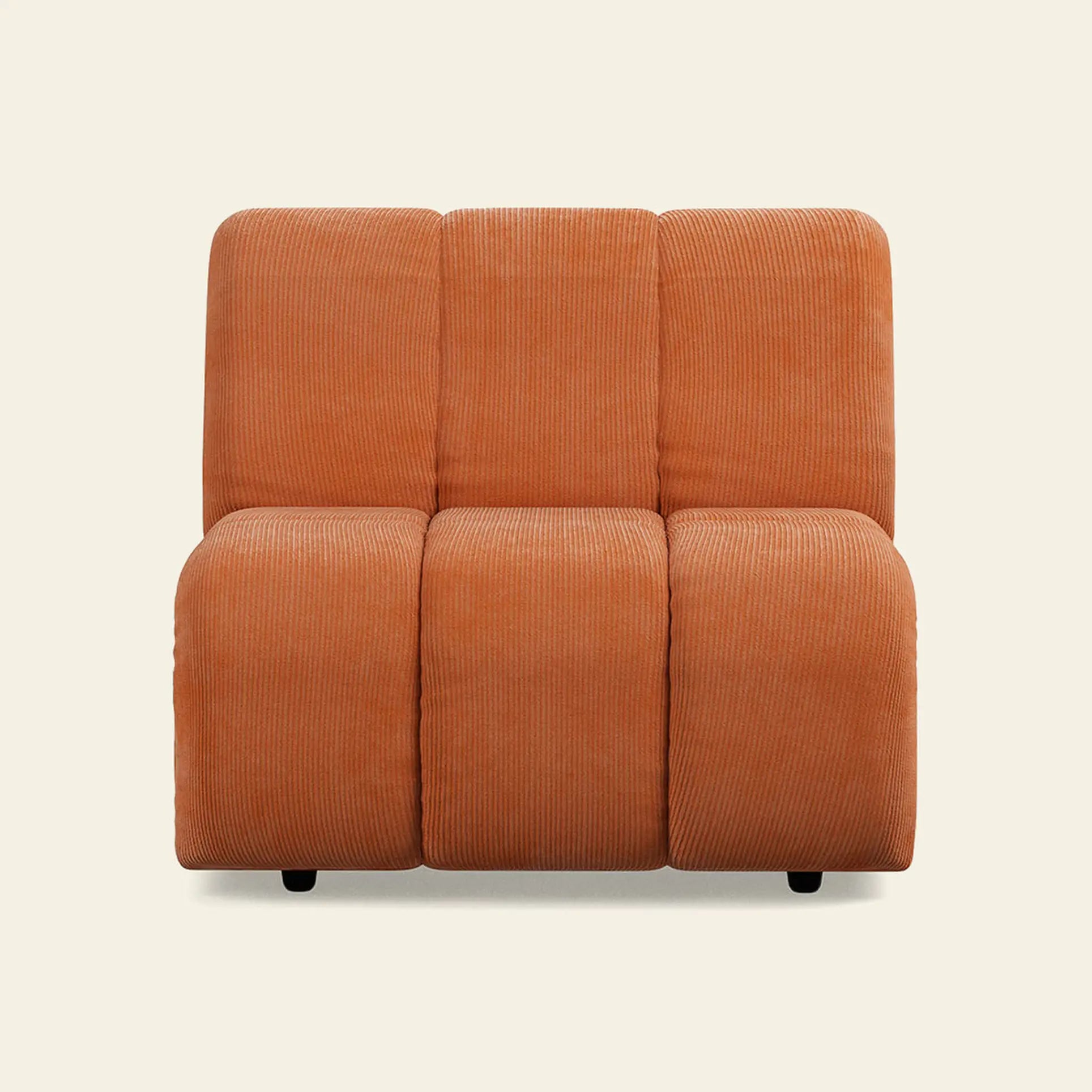 Front view of the HKliving Wave Couch, Middle by HKliving, featuring three orange corduroy sections and soft rectangular cushions inspired by 1970s design, set against a plain light beige background.