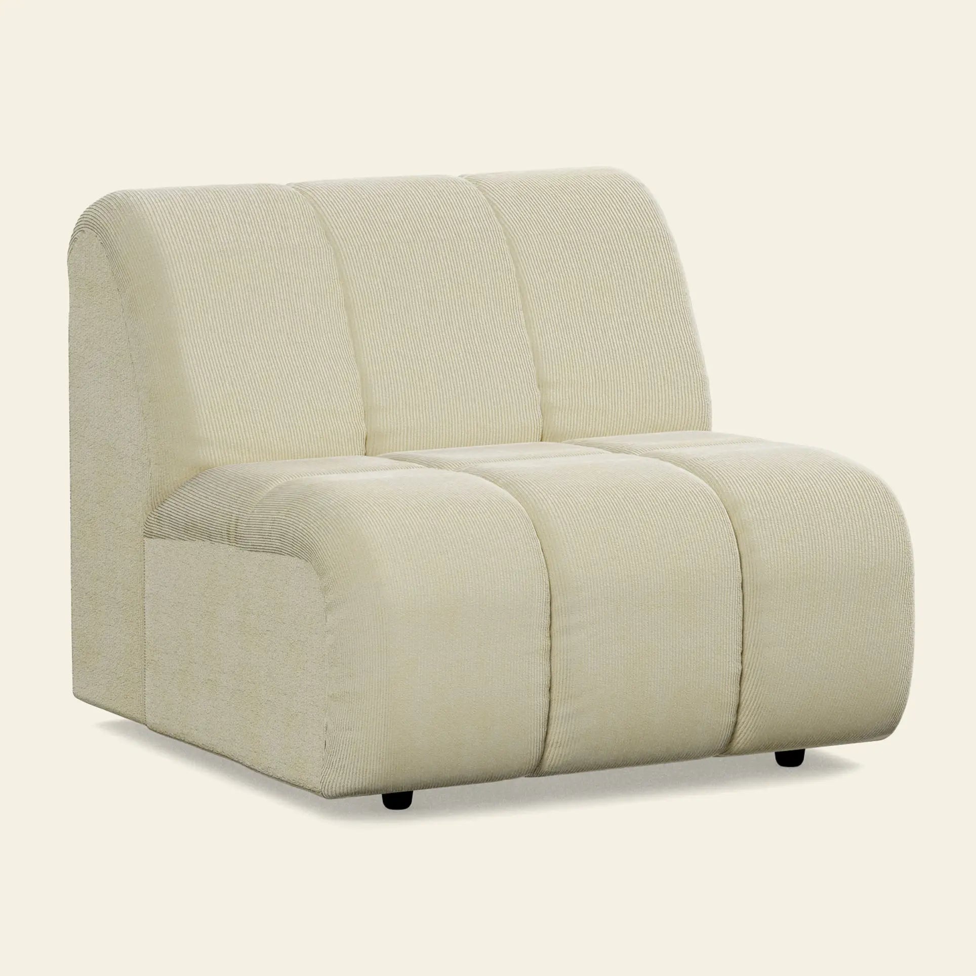The HKliving Wave Couch, Middle by HKliving is a modern, armless accent chair inspired by 1970s design, with plush cream upholstery and subtle horizontal stitching against a plain light background.