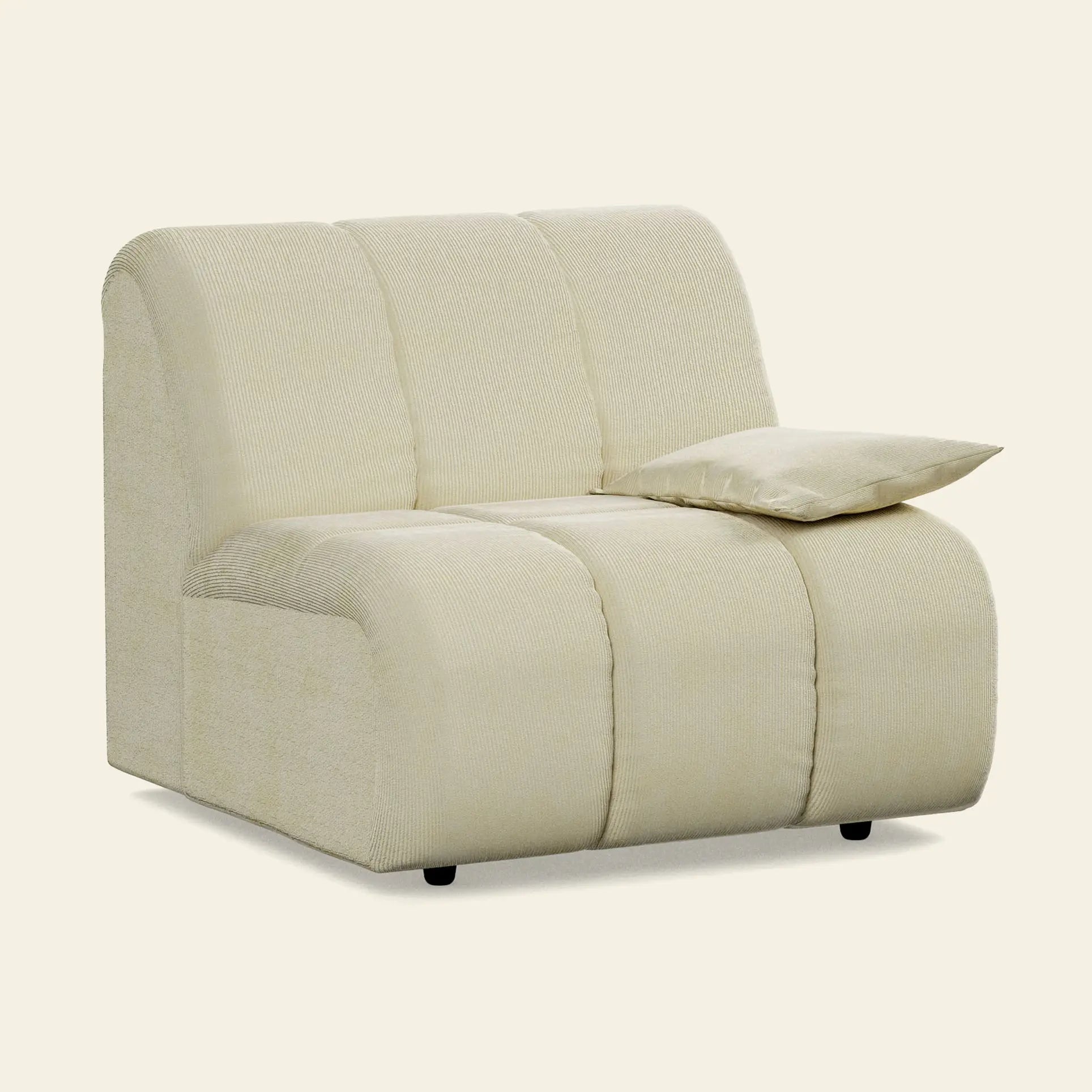 The HKliving Wave Couch, Right Low Arm by HKliving is a modern armless beige lounge chair with plush textured upholstery, low profile, and matching rectangular cushion—an elegant addition to any living room. Set against a plain light background.