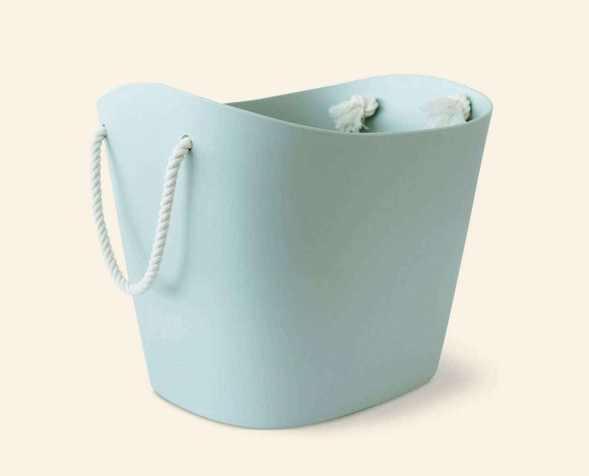 The Hachiman Balcolore Storage Basket M features a minimalist Japanese design in light blue with white rope handles, offering versatile storage from the Hachiman brand.
