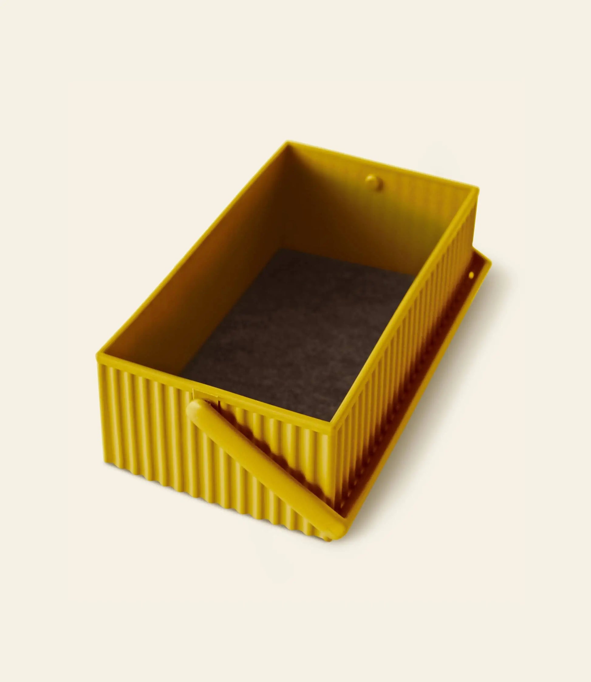 The Hachiman Omnioffre Stackable Storage Box S by Hachiman is a rectangular, yellow plastic container with ribbed sides, an open top, a matching side handle, and a modern minimalist design shown on a light background.