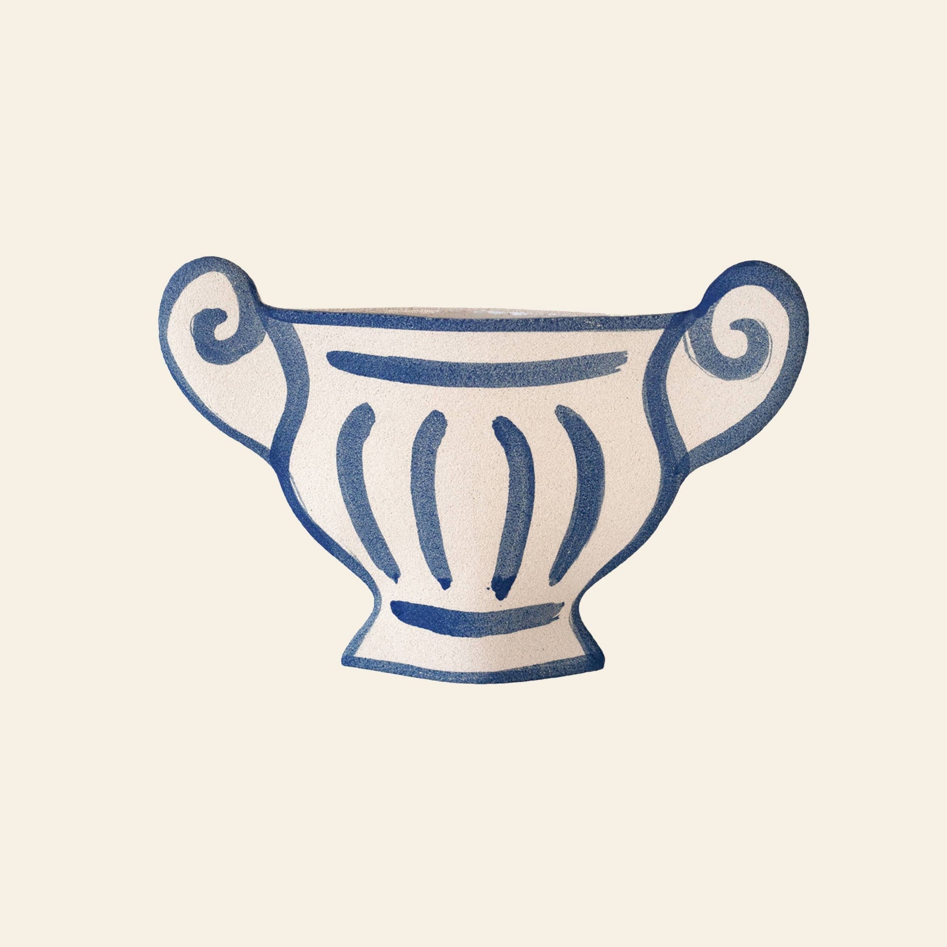The INI CERAMIQUE Greek Coupe Ceramic Vase features a stylized white trophy cup design inspired by Greek Coupe vases, with blue lines and swirls on a light beige background.
