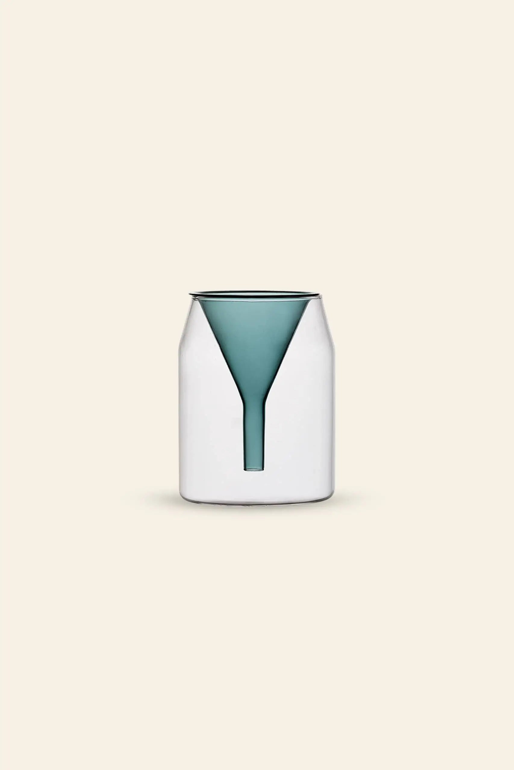 The Ichendorf Milano Kado Single Flower Vase (16cm) features a modern, minimalist white design with a teal, funnel-shaped insert, reminiscent of hand-flamed glass, shown upright against a plain beige background.