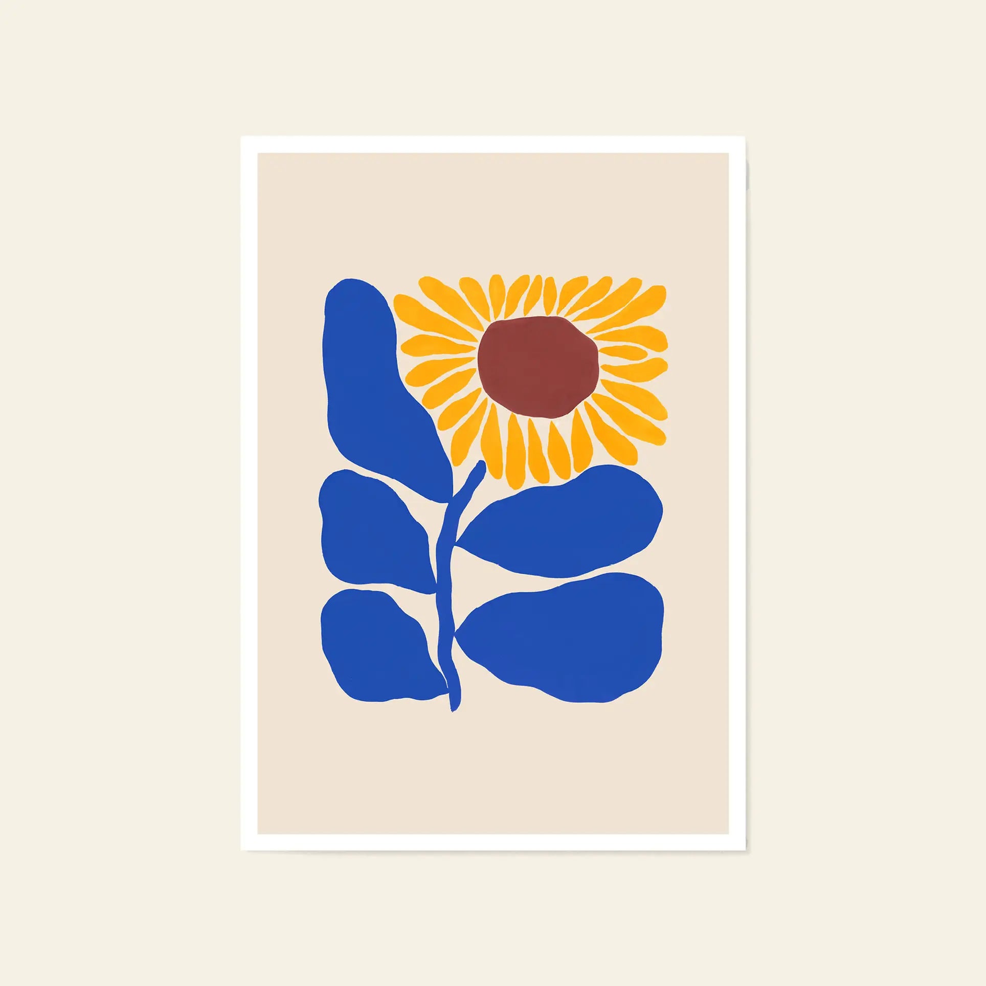 The Liv Lee Sunflower print by Liv Lee features a minimalist sunflower with a brown center, yellow petals, and bold blue leaves on beige, framed with a white border. Archival-quality giclée printed on Hahnemühle stock.