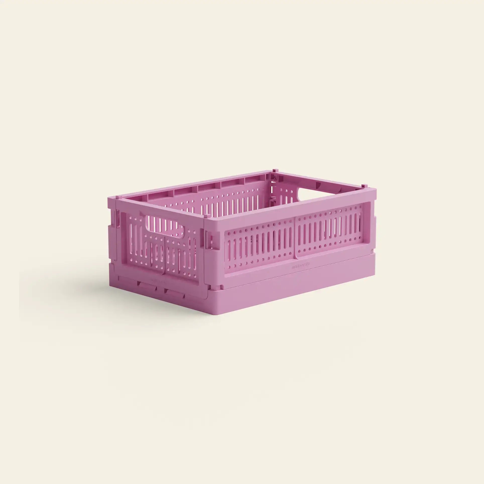 The Made Crate Mini by Made Crate is a light purple, eco-friendly folding crate crafted from recycled plastic, shown assembled and empty on an off-white background—ideal for stacking and sustainable storage.