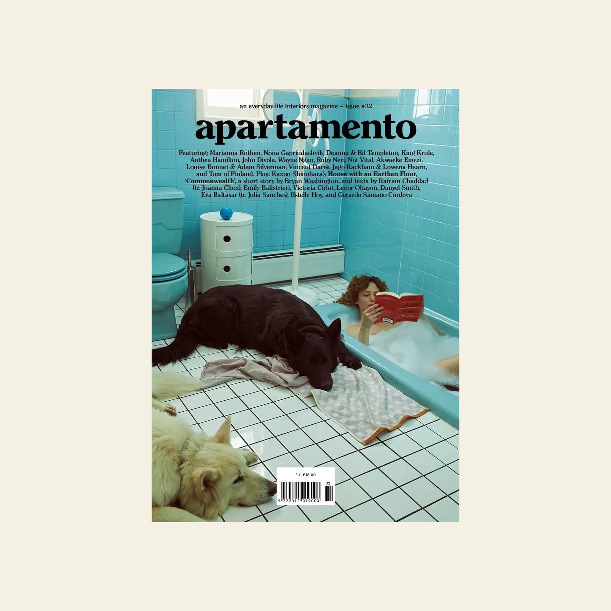 A person relaxes in a light blue-tiled bathroom, reading in the tub while two large dogs rest nearby. Apartamento Magazine Issue #32 by Apartamento is featured at the top.
