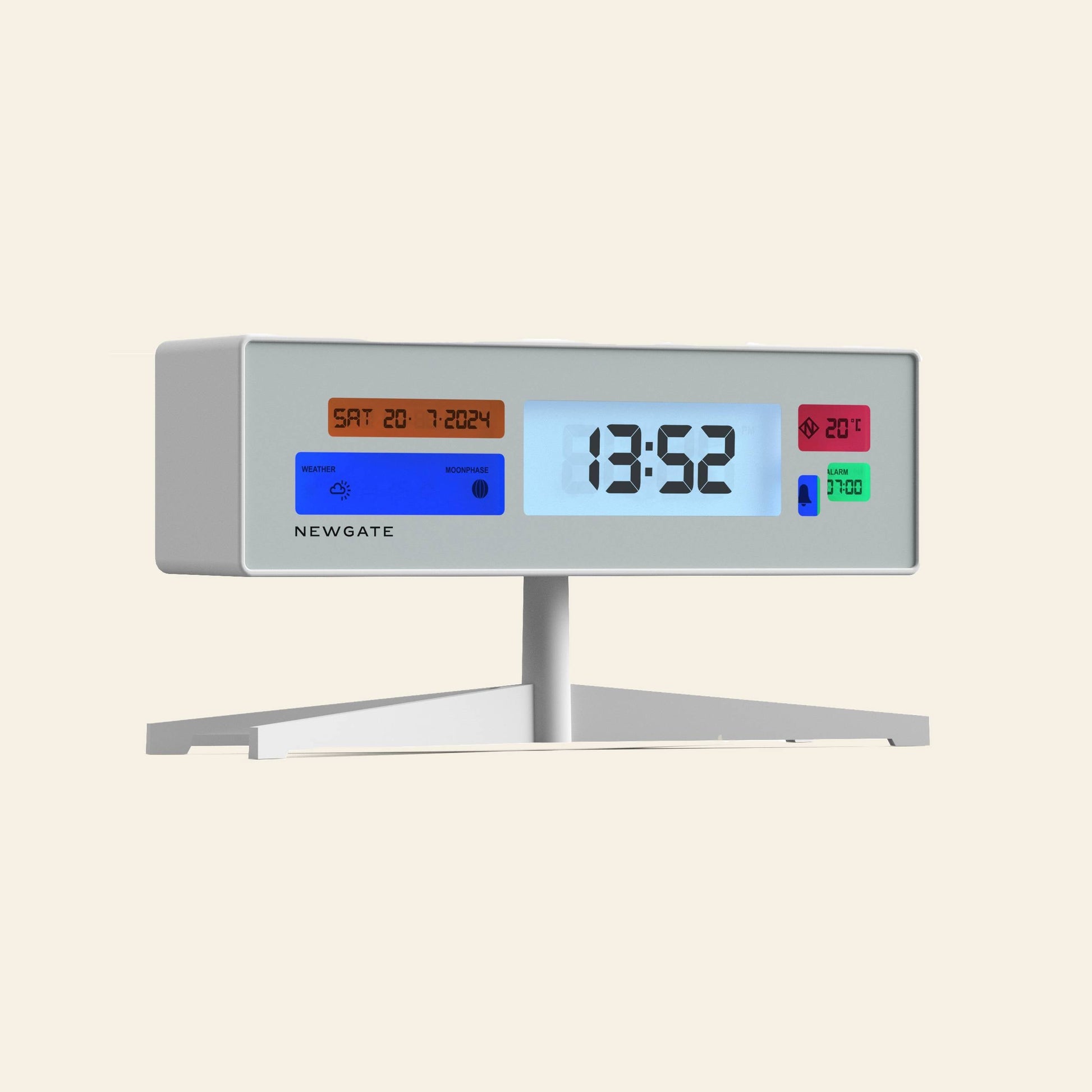 The Newgate Supergenius LCD Alarm Clock by Newgate shows the time as 13:52, date as Saturday 20-7-2024, and temperature at 20°C. It has a rectangular design with a white stand, colored display sections, and includes a USB power cable.