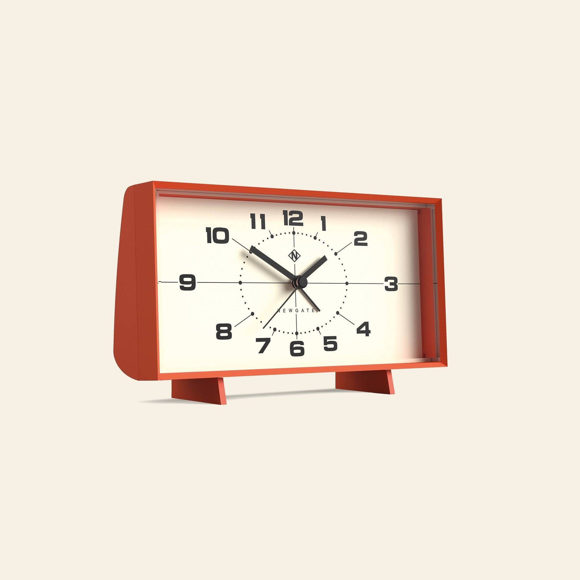 The Newgate Wideboy Alarm Clock by Newgate features a rectangular, retro design with a red frame, white face, black numbers, and black hands. It stands on two small legs against a plain, light background.