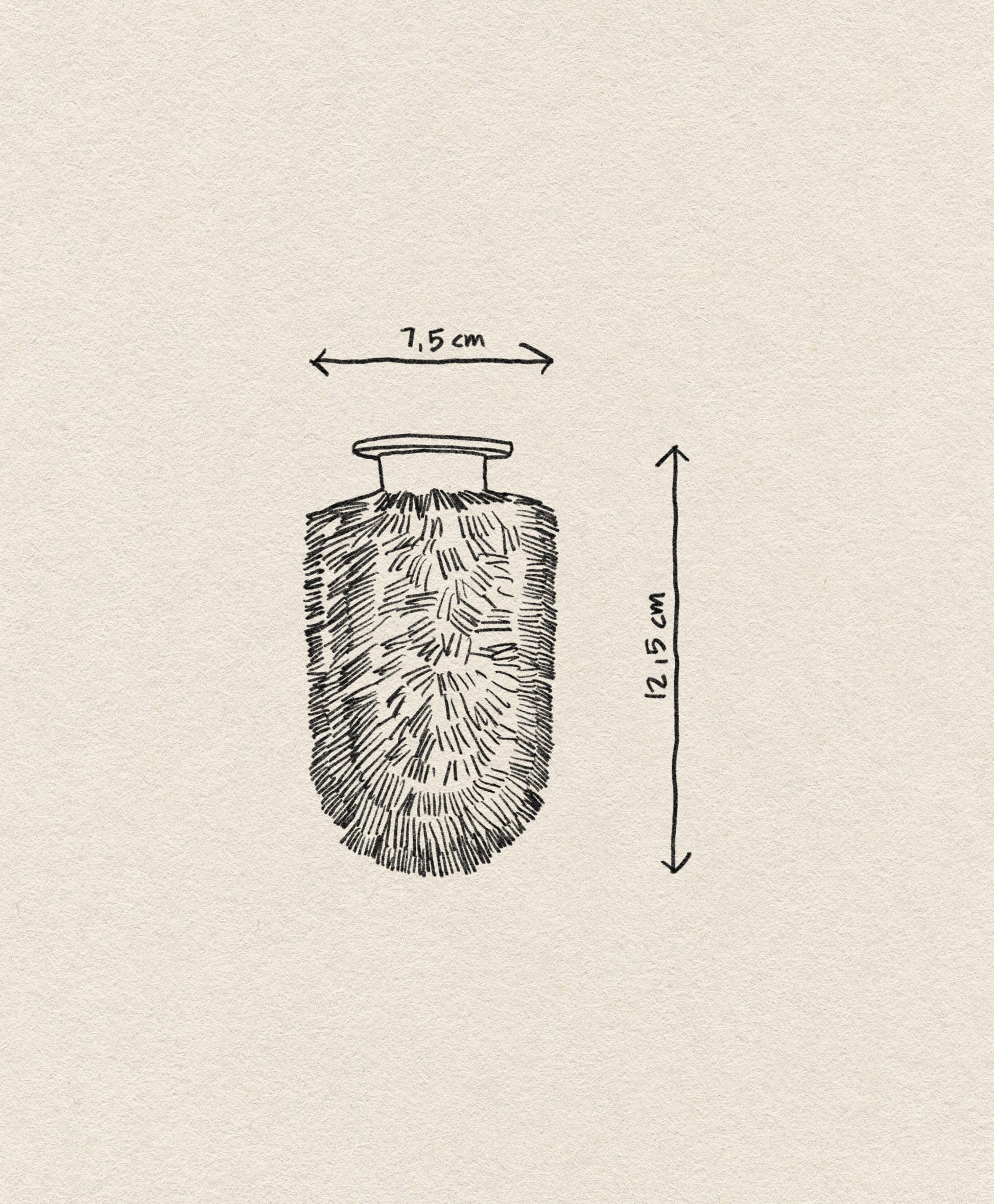 A hand-drawn sketch of the Normann Copenhagen Ballo Brush Head, labeled with its dimensions on off-white paper; a unique detail perfect for any modern home décor enthusiast.