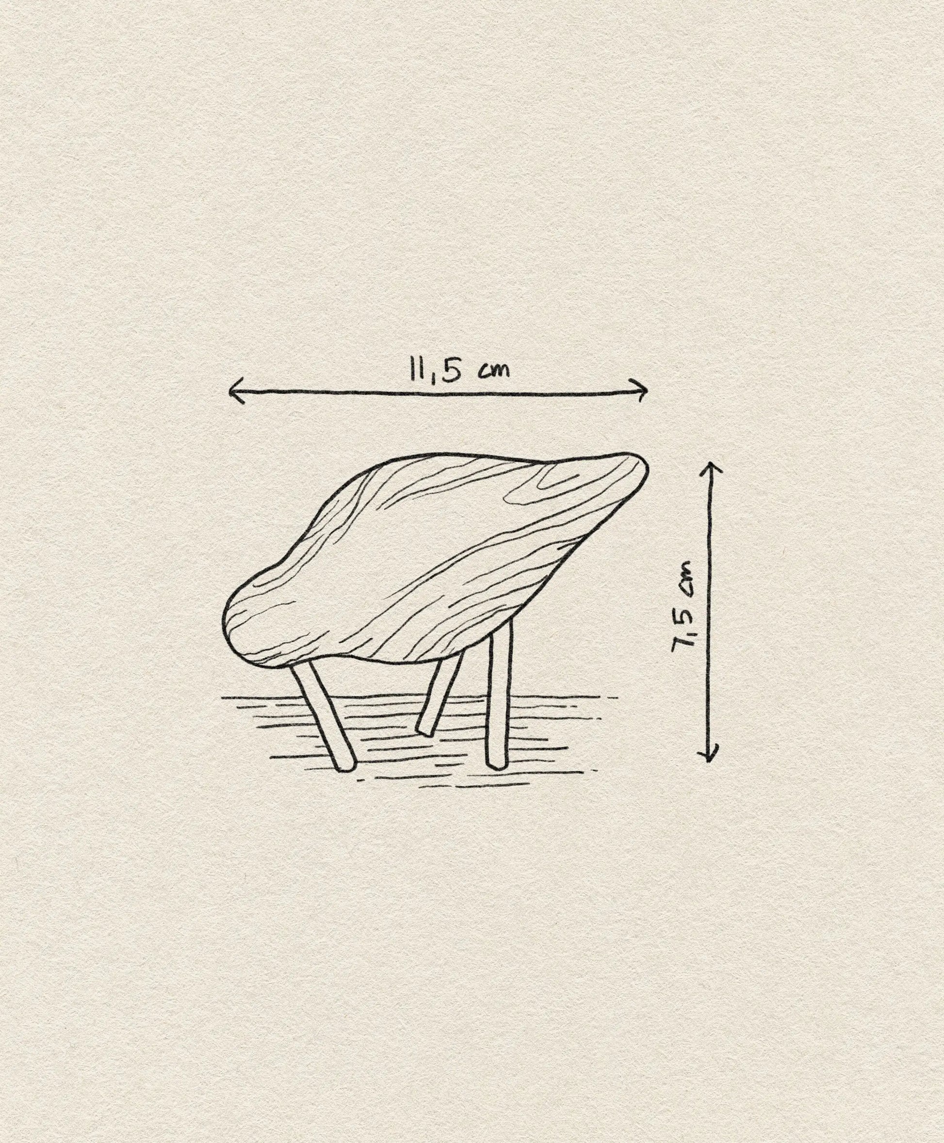 A simple sketch of the Normann Copenhagen Shorebird Small Oak by Normann Copenhagen, featuring a minimalist, four-legged design in oak wood, measuring 11.5 cm wide and 7.5 cm tall on a textured beige background.