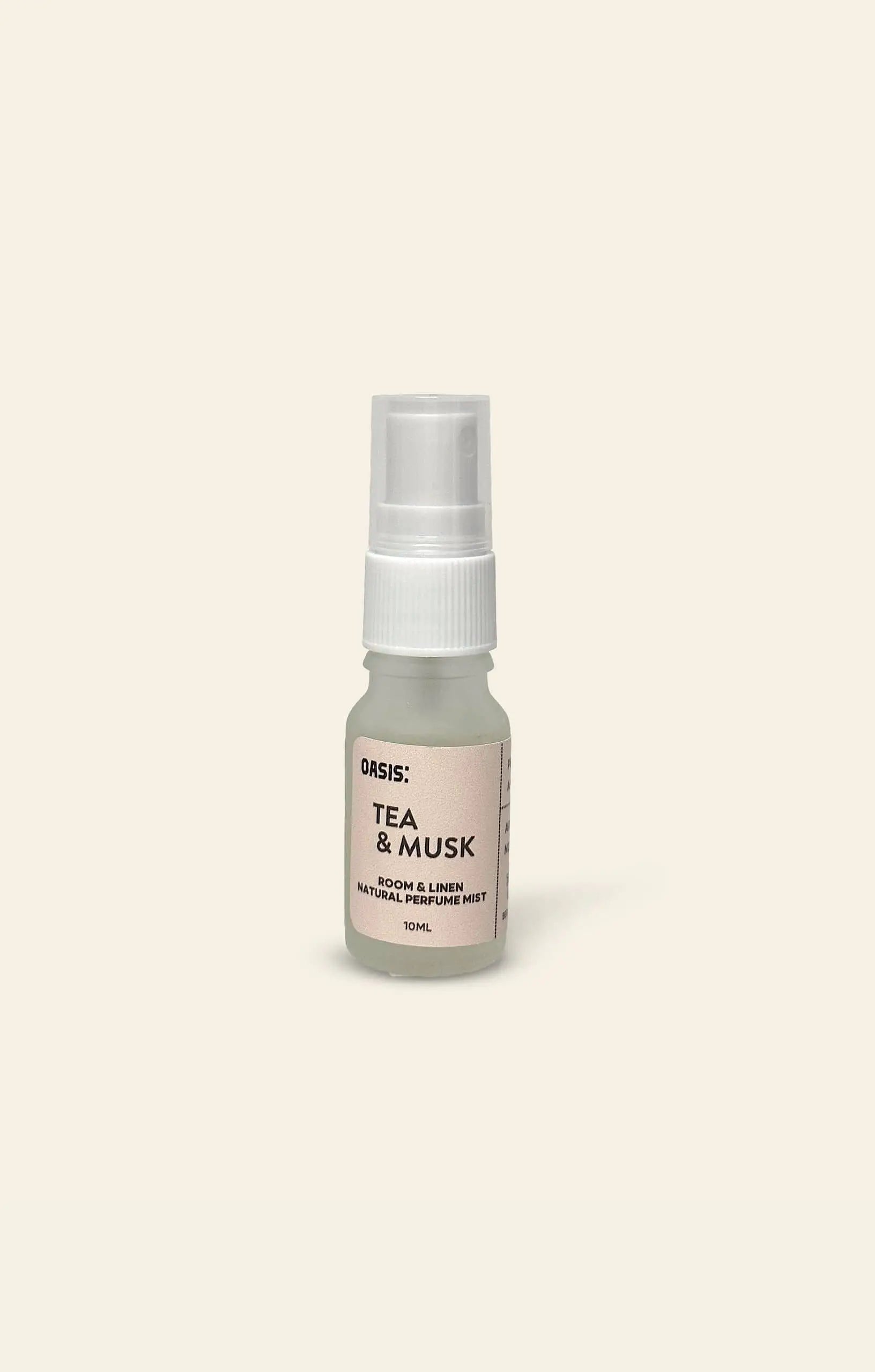A 10ml Oasis Beauty Kitchen Room and Linen Mist by Oasis Beauty Kitchen rests on a light beige background, delivering a perfume-grade spray with fresh linen notes for natural air refreshment.