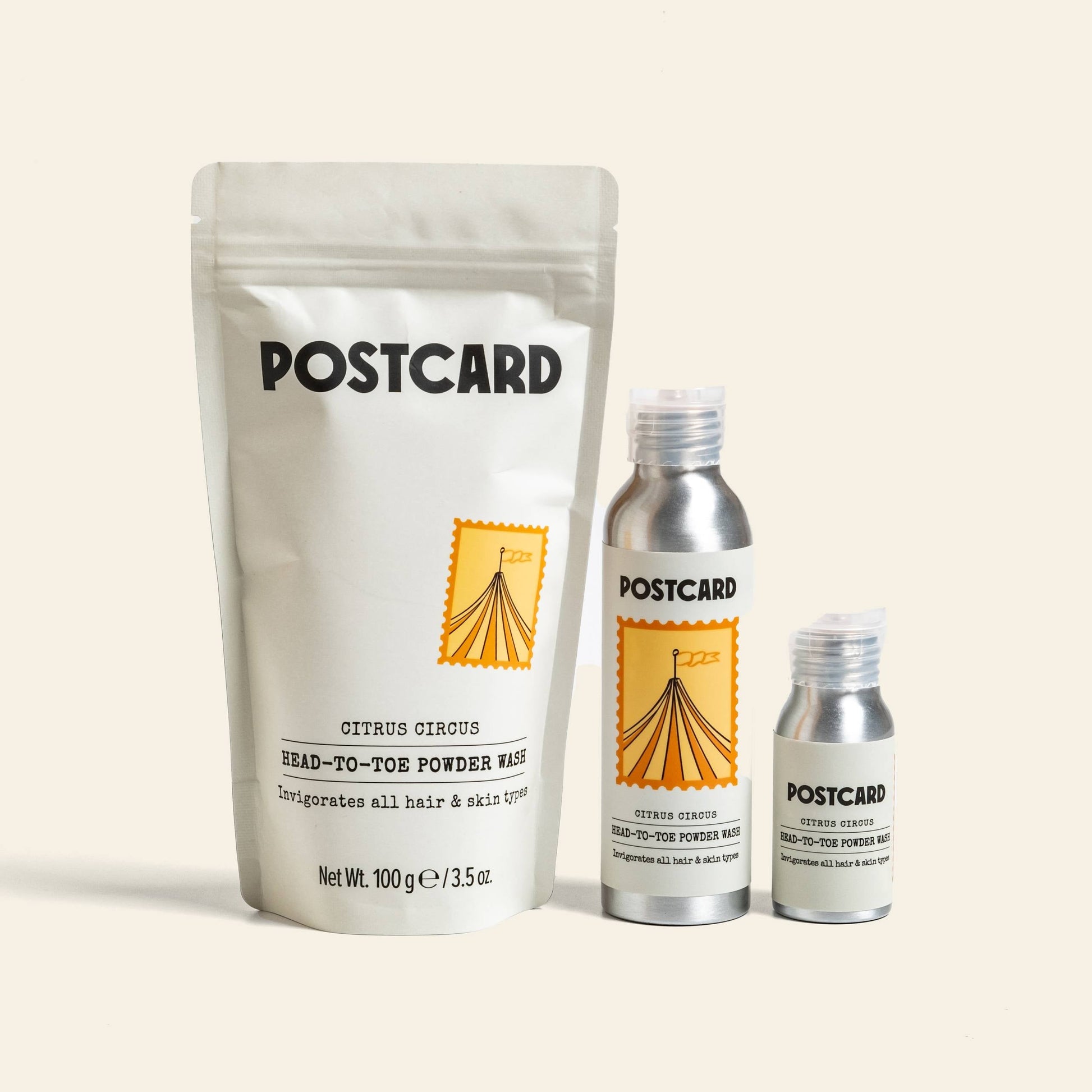 Postcard’s 80g Head-To-Toe Powder Wash in Citrus Circus comes in a stand-up pouch and two aluminum bottles, featuring a vitamin C-infused powder-to-foam cleanser with playful circus tent illustrations.