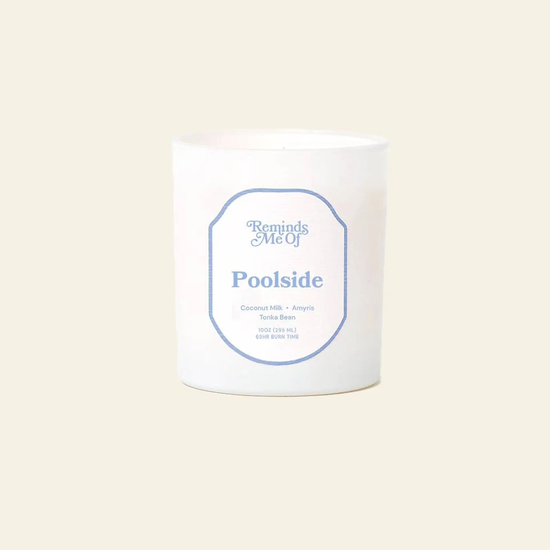 The Reminds Me Of Poolside Candle, 10oz by Reminds Me Of, featuring notes of coconut milk, coconut lotion, amyris, and tonka bean in a white glass jar, is displayed on a beige background.