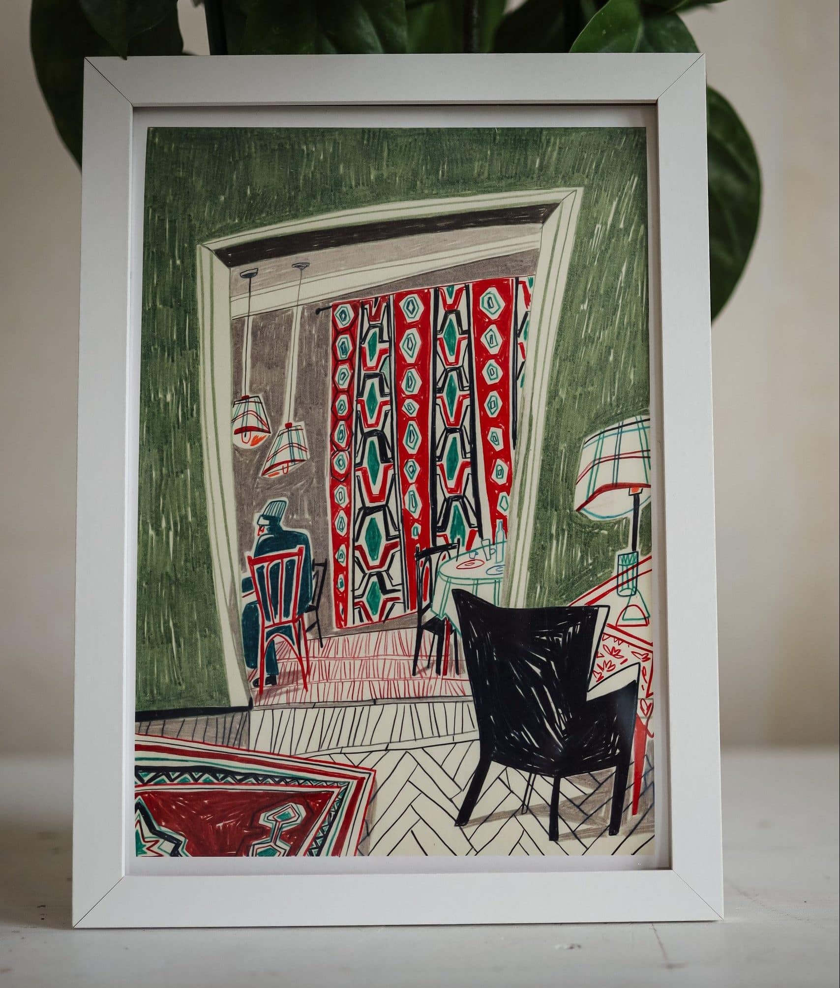 The Traditional Armenian Interior with Carpet print by Sarah Mari Shaboyan features a vibrant room with patterned red and green curtains, a carpet, chairs, a table with a checkered lamp, green walls, and is displayed in front of a leafy plant.
