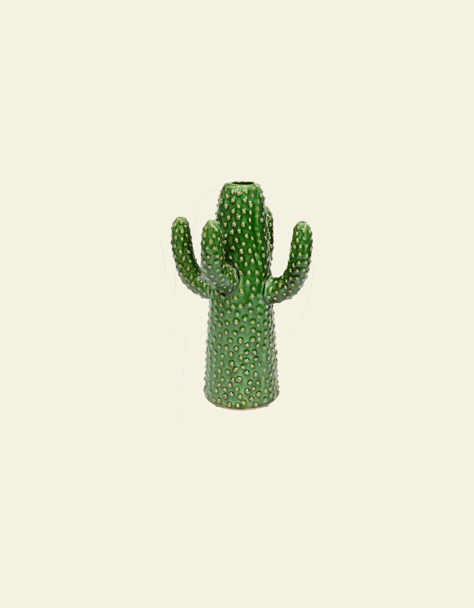 The Serax Urban Jungle Cactus Vase M - Green by Serax features three arms and white dots, creating an exotic look that stands out against a plain off-white background.