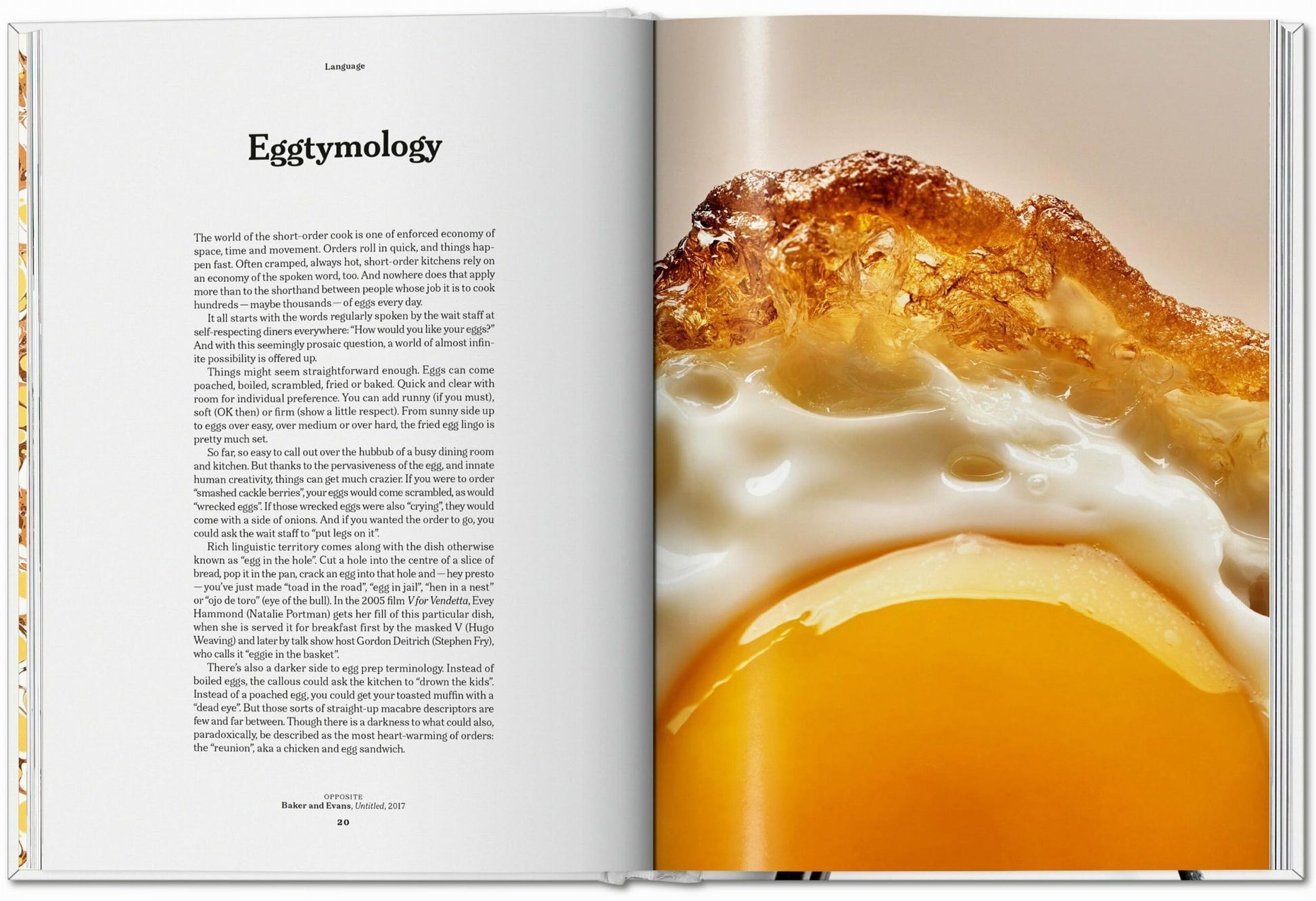 An open TASCHEN The Gourmand’s Egg: A Collection of Stories and Recipes shows a close-up of a crispy fried egg on the right page and an article titled Eggtymology on the left, blending food and art.