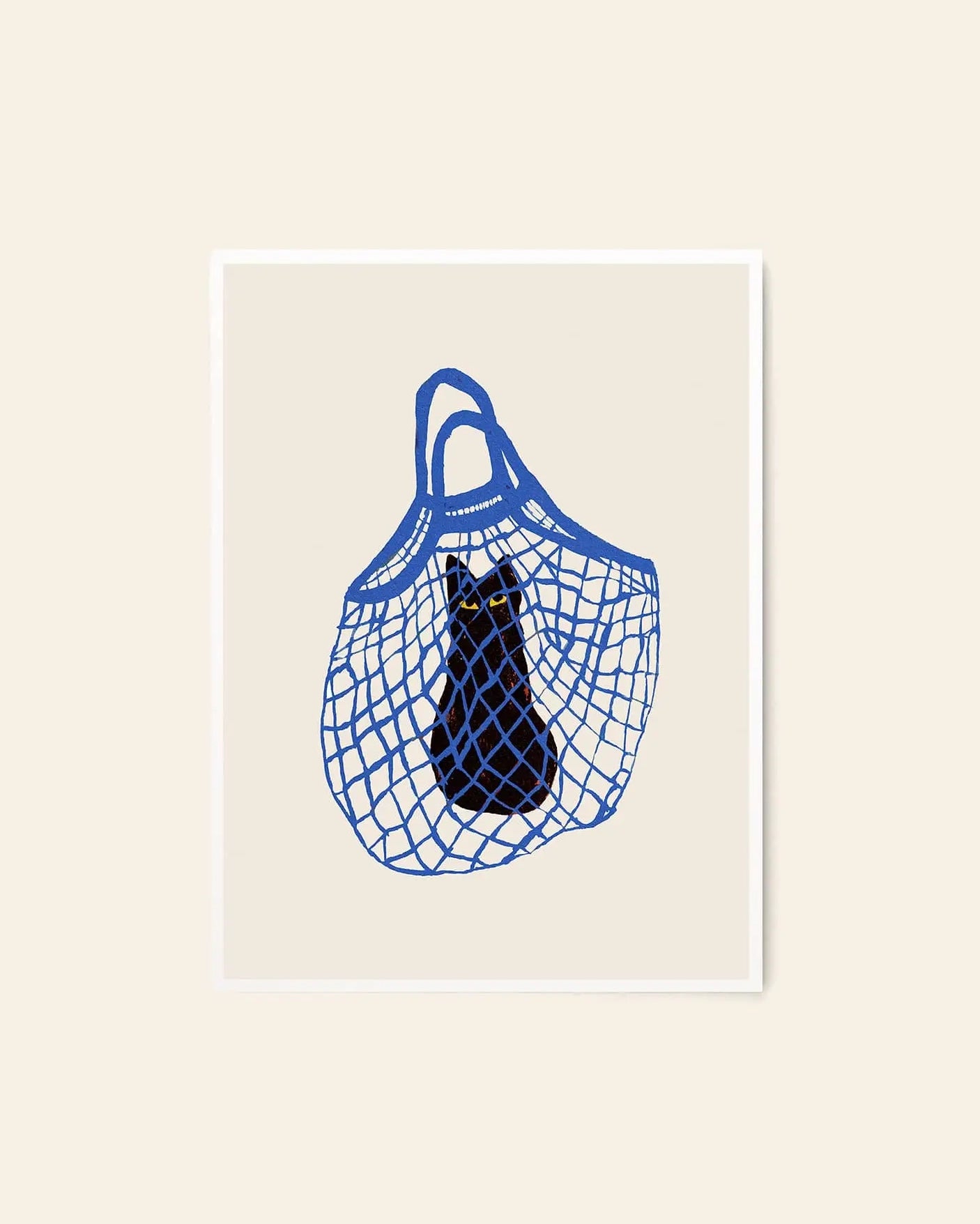 The Poster Club Chloe Purpero Johnson - The Cat’s In The Bag (50x70) features a black cat sitting in a blue mesh bag with wide eyes, set against a beige background, in this fine art print by The Poster Club.