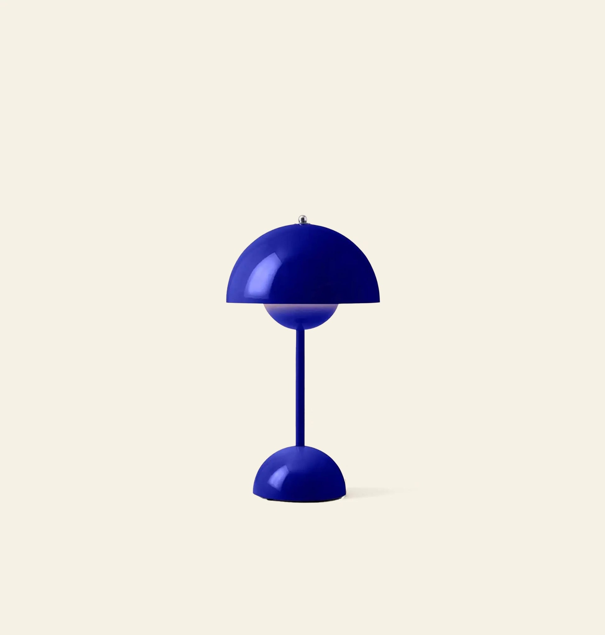 The &Tradition Flowerpot VP9 Portable Table Lamp by &Tradition features a modern blue dome-shaped shade, matching round base, USB charging cable, and portable design. Shown against a plain light beige background.