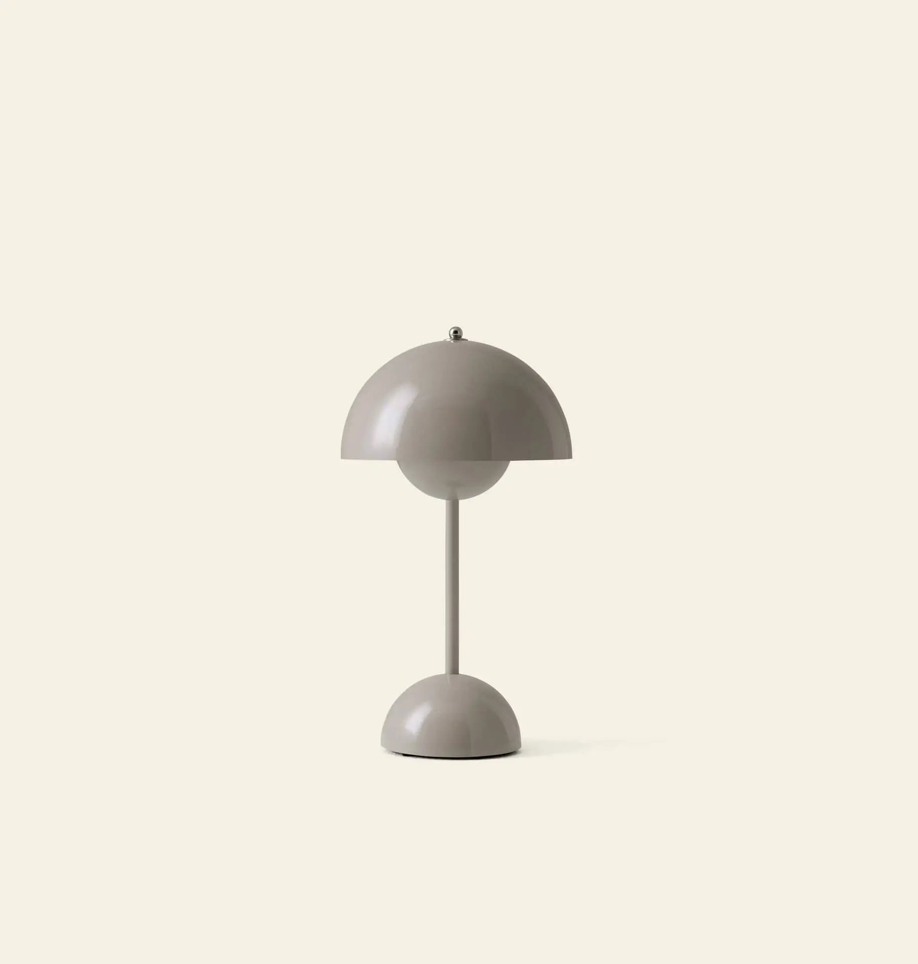 The &Tradition Flowerpot VP9 Portable Table Lamp by &Tradition features a modern, minimalist taupe dome shade and base, portable VP9 design, USB charging cable, all set against a plain light background.