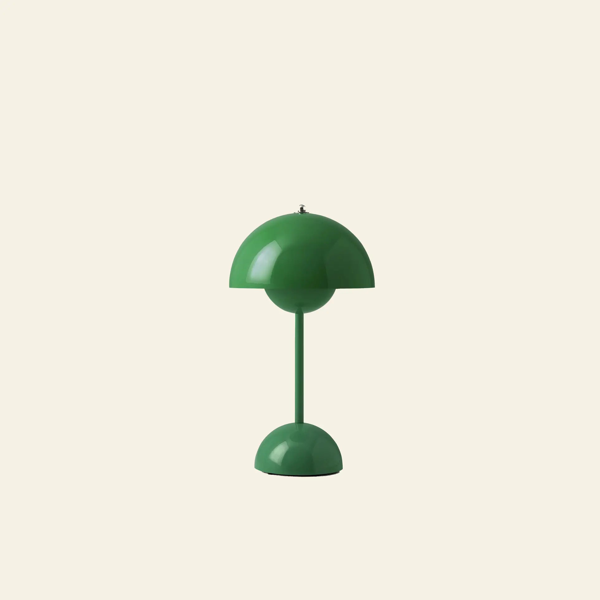 The &Tradition Flowerpot VP9 Portable Table Lamp features a modern green design with a dome-shaped shade and base, shown against a plain beige background. This lamp includes a USB charging cable for convenient portability.