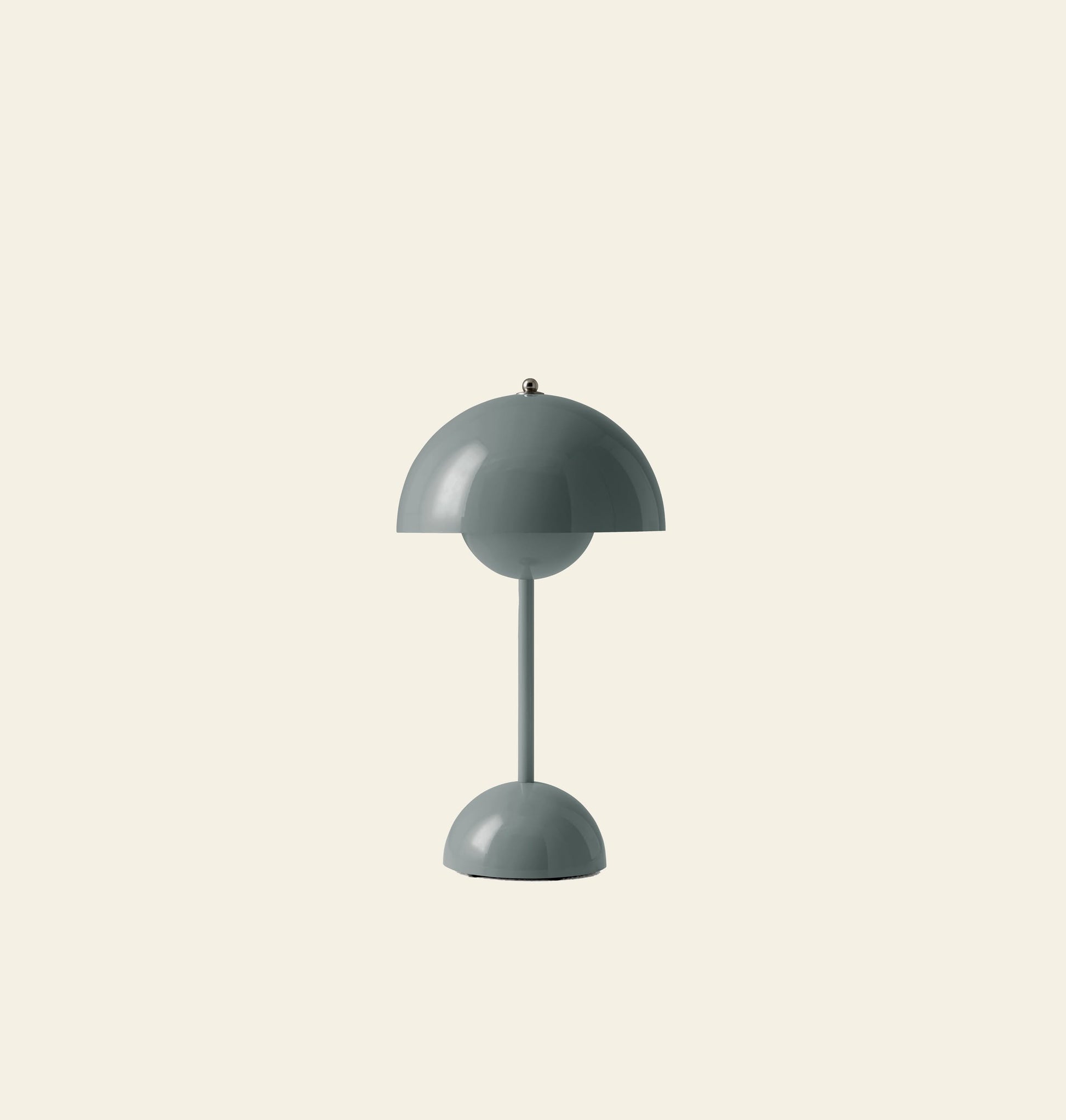 The &Tradition Flowerpot VP9 Portable Table Lamp features a sleek grey dome-shaped shade and base connected by a slender stem, making it a stylish and versatile lighting option from &Tradition for any space.