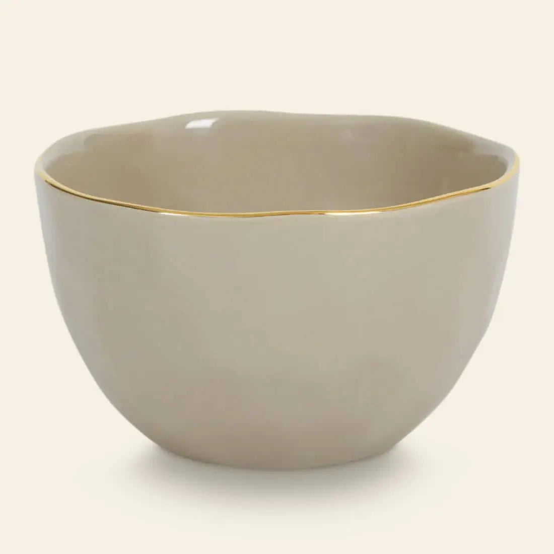 The Urban Nature Culture Good Morning Bowl features a beige ceramic design with a wavy rim and thin gold edge, combining elegance and simplicity—ideal for breakfast—set against a plain light background.