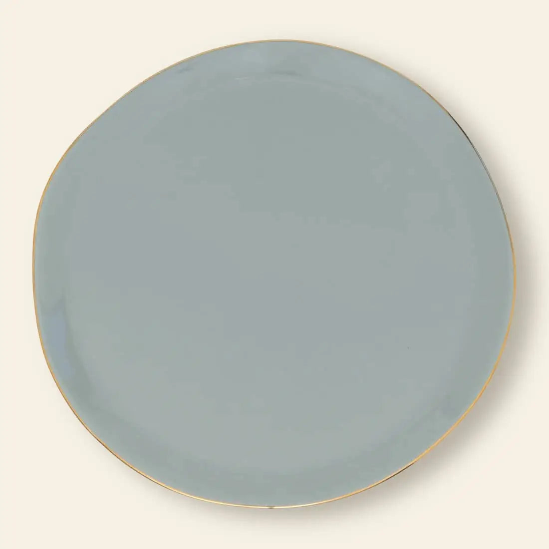 The Urban Nature Culture Good Morning Breakfast Plate features a round, light gray design with a slightly irregular edge and thin gold rim, set against an off-white background for a refined, modern look.