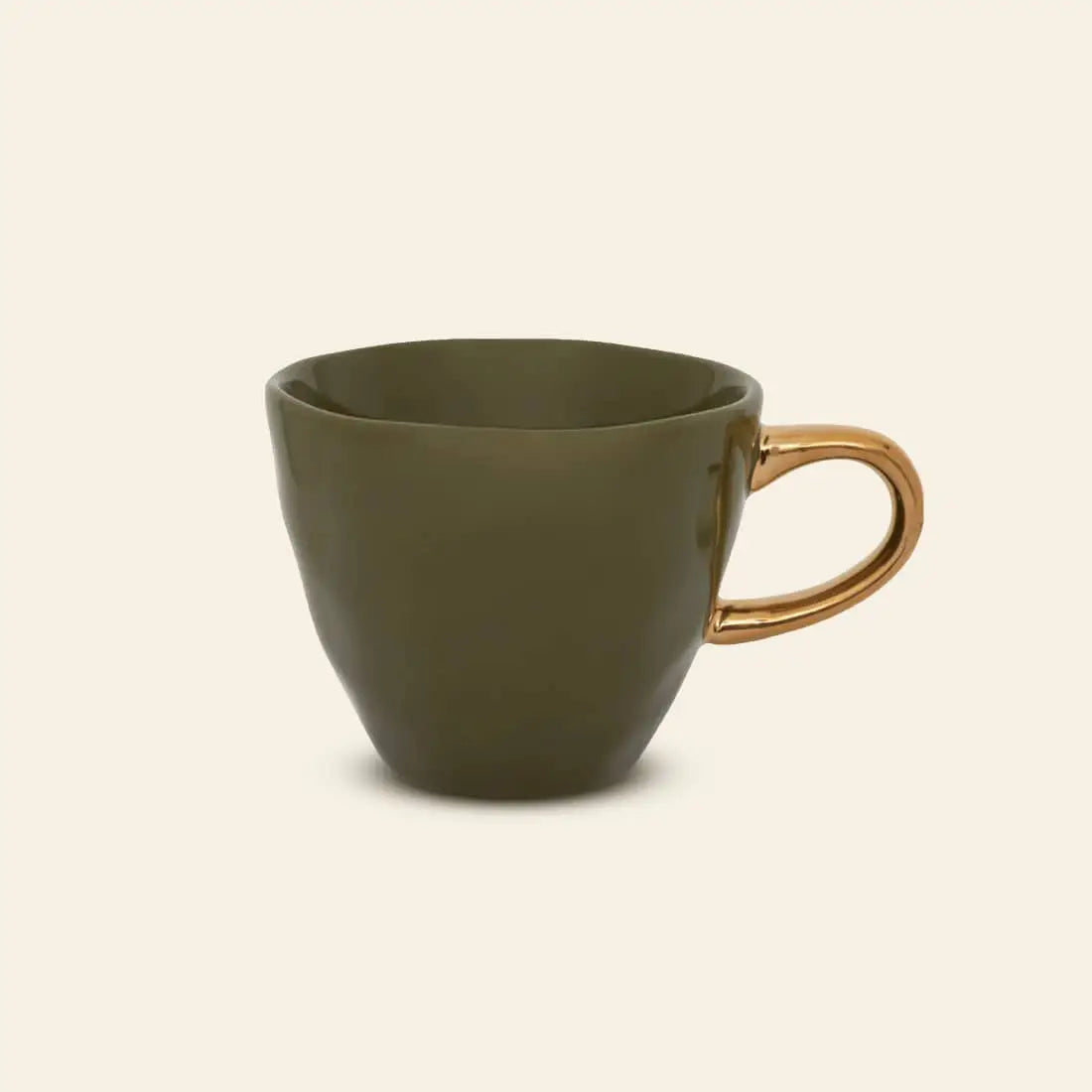 The Urban Nature Culture Good Morning Cup Mini by Urban Nature Culture features a green ceramic finish and a shiny gold handle, displayed on a plain light beige background.