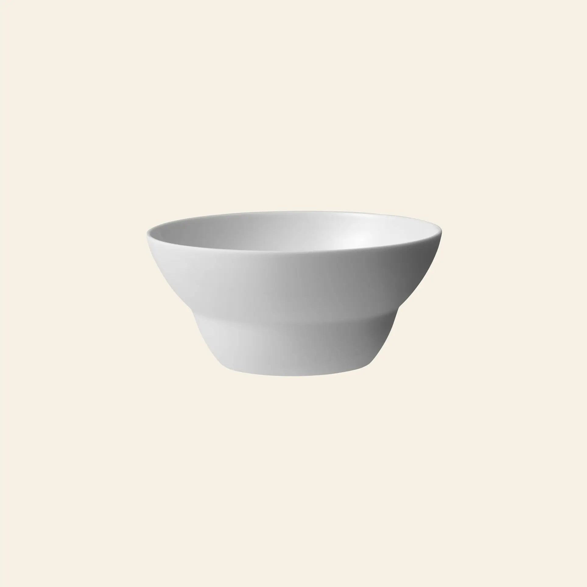The Vipp Vipp215 Bowls, Set of 2 by Vipp are crafted from premium porcelain with smooth, minimalist lines and shown against a light beige background.