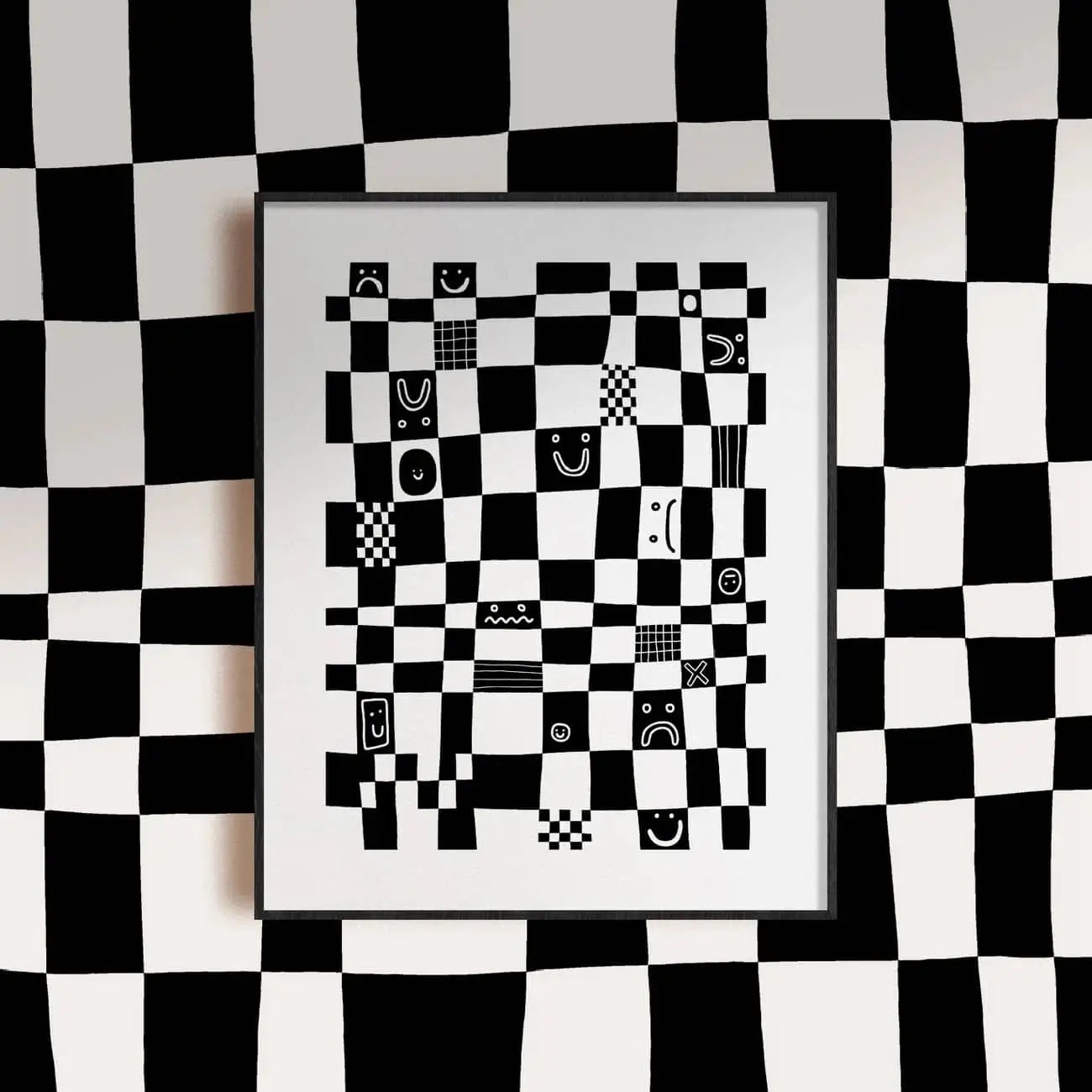 The Wobbly Studio Checkmate (30x40) by Wobbly Studio is a framed digital print with wavy black-and-white checks and face doodles, displayed against a matching distorted checkered wall.