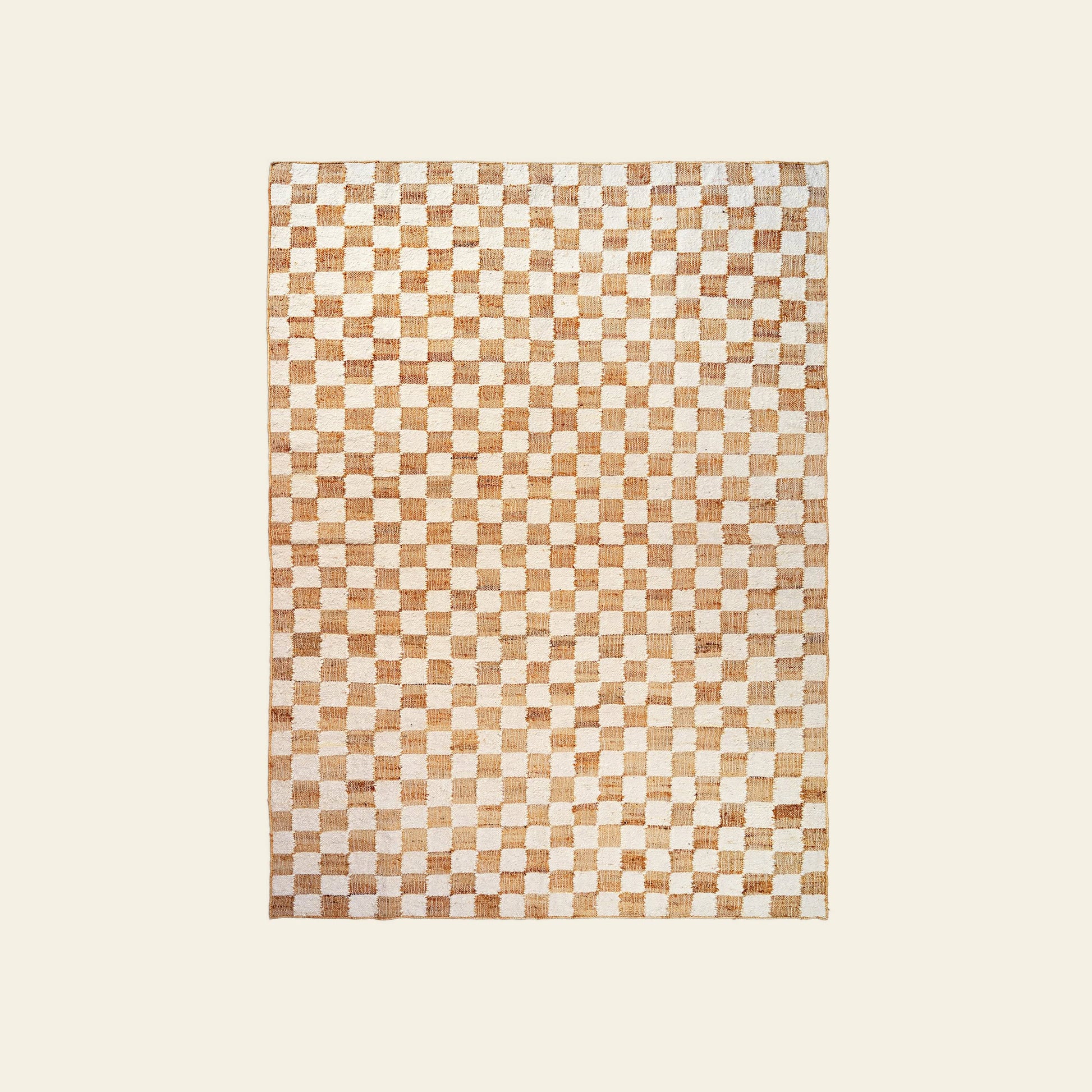 The ferm LIVING Check Wool Jute Rug (200x300) features a classic rectangular design with alternating tan and off-white squares, shown on a light beige background.