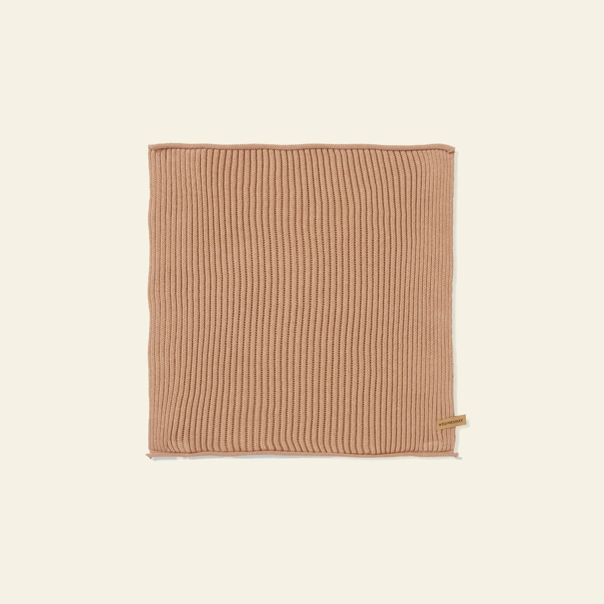 A set of seven rectangular ferm LIVING Day Cloths in organic cotton, shown flat on a neutral background, each featuring a small fabric label on one side.