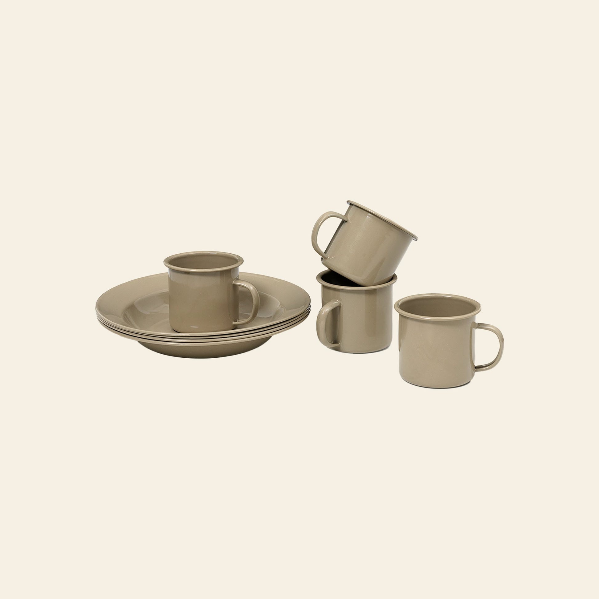 The ferm LIVING Yard Picnic, Set of 8 by ferm LIVING features four beige ceramic cups with handles and two matching plates, elegantly stacked on a plain background—a perfect minimalist set for stylish and functional outdoor dining.