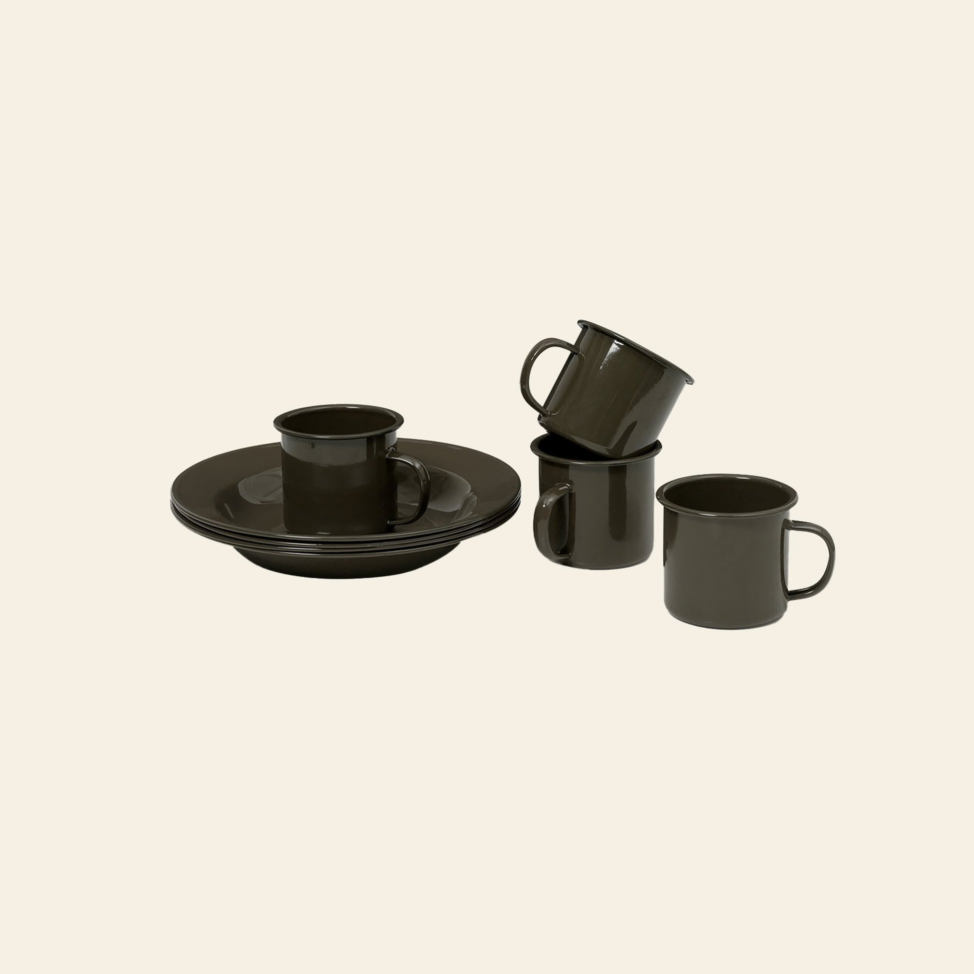 The ferm LIVING Yard Picnic, Set of 8 by ferm LIVING features dark brown ceramic tableware—one plate and four mugs displayed on a light beige surface, with three mugs stacked and one placed inside the plate. Perfect for outdoor dining.