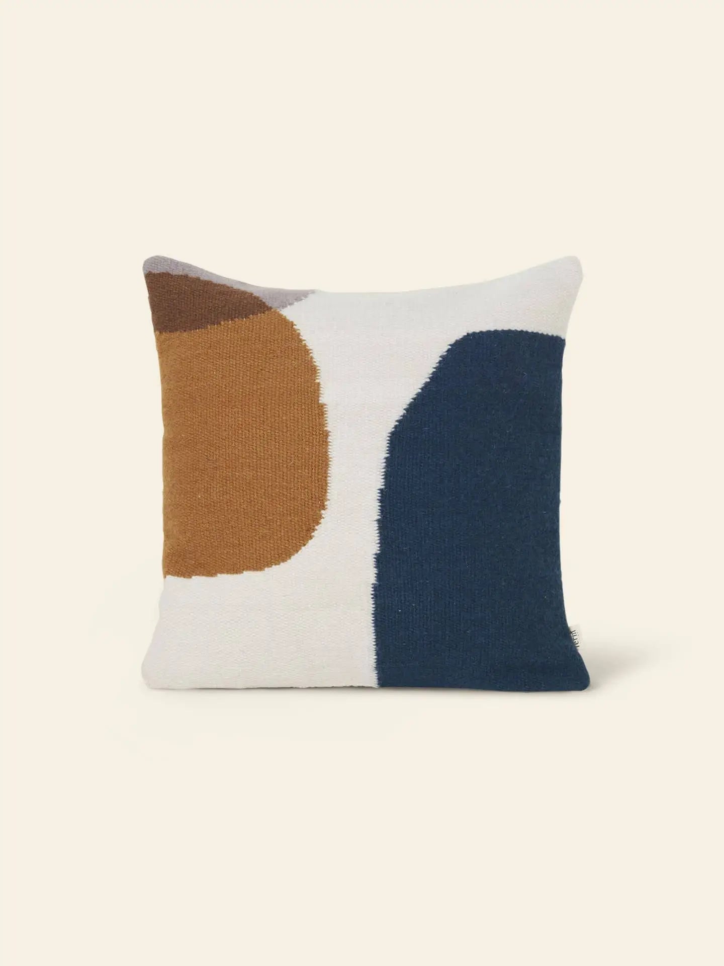The ferm LIVING Kelim Cushion by ferm LIVING features abstract geometric shapes in mustard yellow, dark blue, brown, and white on cream—ideal for bringing Scandi style and a splash of color to any room.