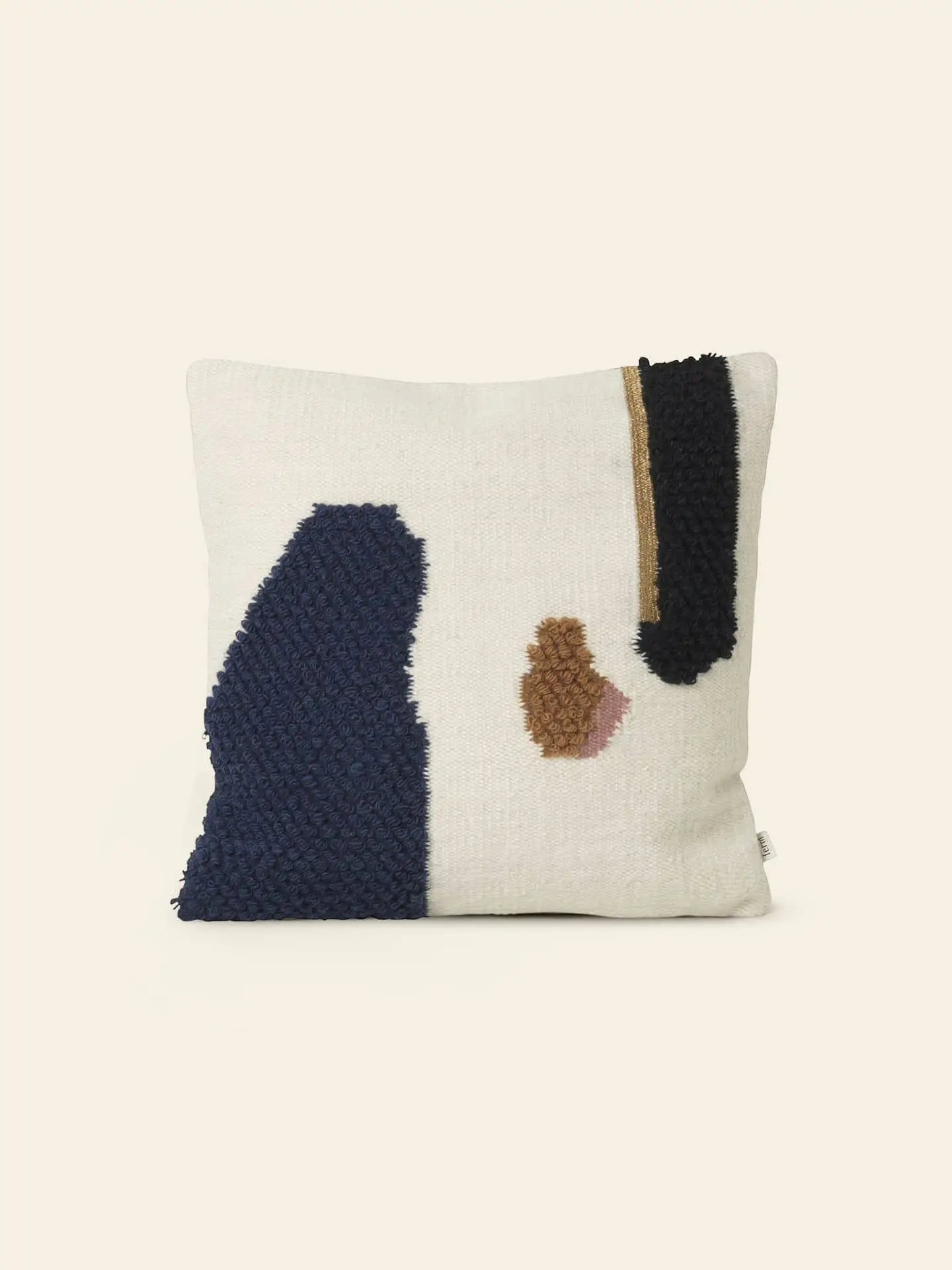 The ferm LIVING Loop Cushion is a square decorative pillow made from soft New Zealand wool, featuring abstract textured shapes in navy, brown, black, and light pink—a modern accent with minimalist flair for any space.