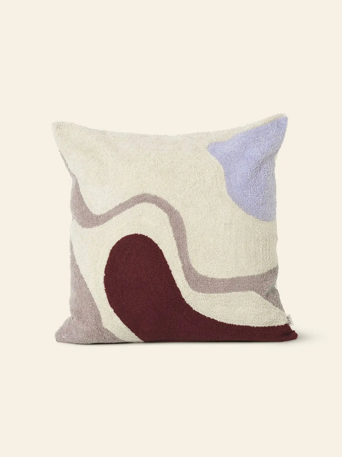 The ferm LIVING Vista Cushion features an abstract wavy pattern in cream, burgundy, light blue, and taupe—an elegant accent by ferm LIVING, perfect for modern spaces and ideal as a stylish cushion against a plain light background.