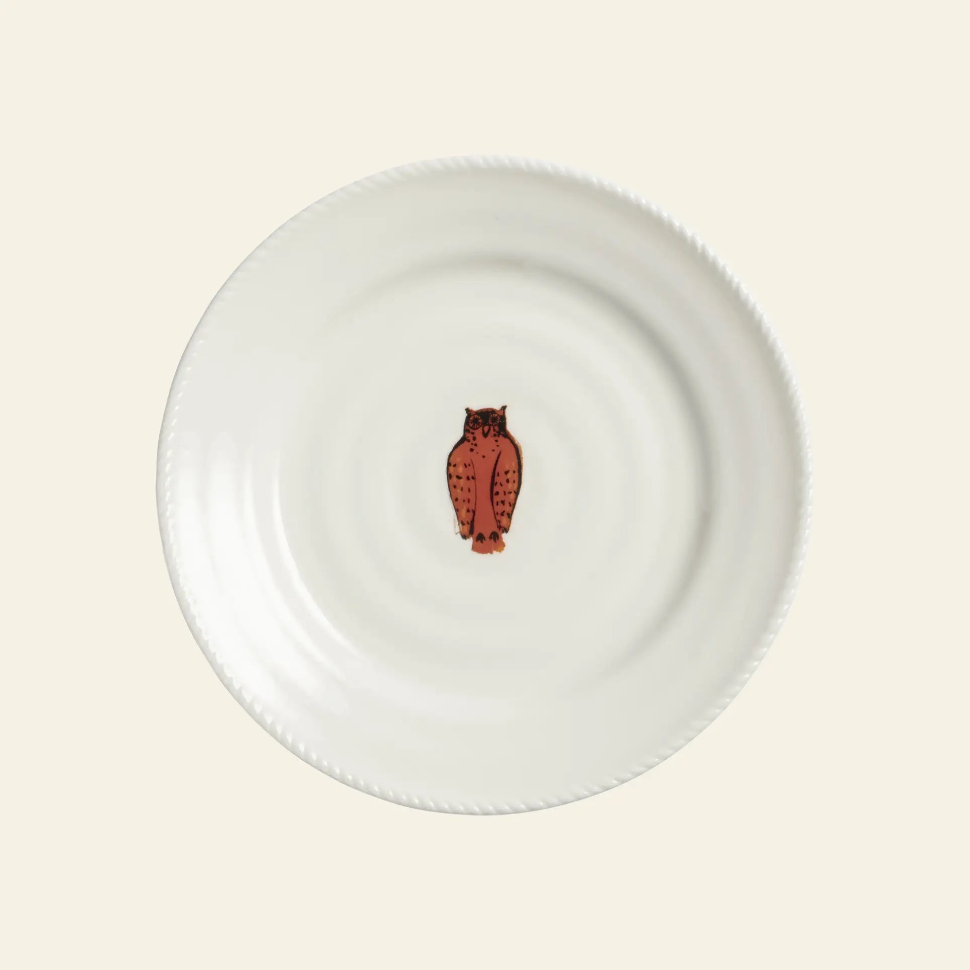 The &klevering Autumn Plate Small, Set of 4 by &klevering features white ceramic plates each with a small brown owl illustration in the center, highlighting nature-inspired prints on a plain light background.