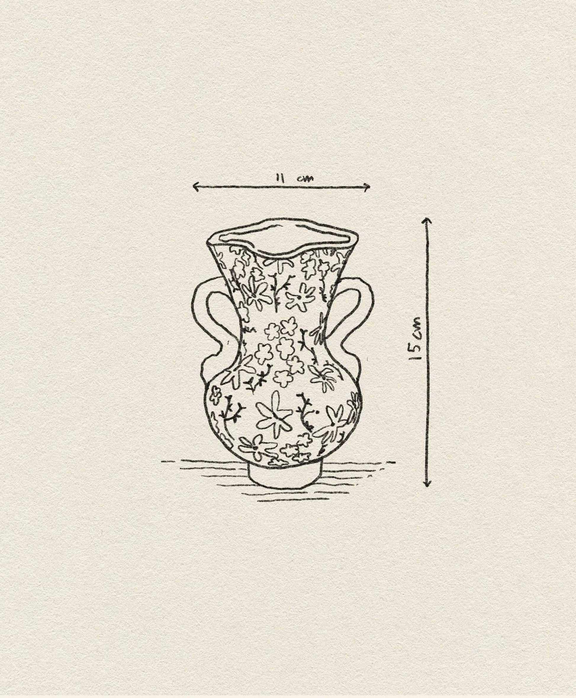 The &klevering Buttercup Vase by &klevering features petite flowers and two handles in a hand-drawn romantic style, measuring 11 cm wide and 15 cm tall, displayed on textured paper.
