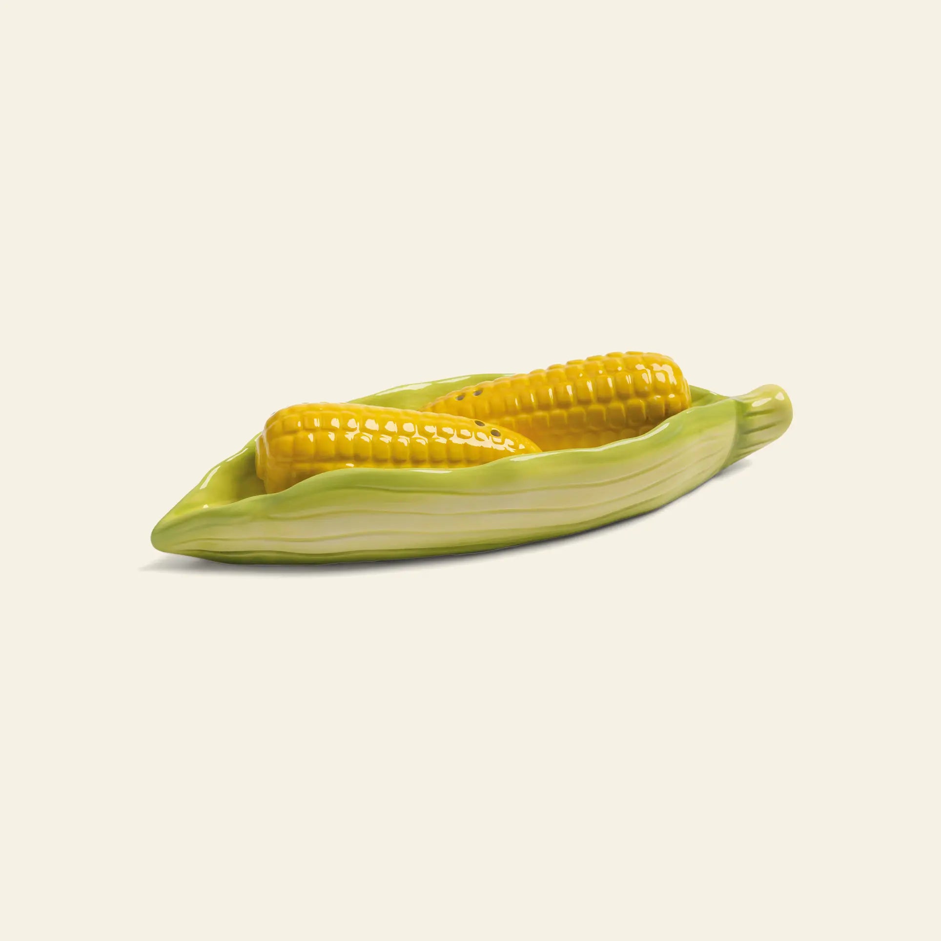 The &klevering Corn Salt & Pepper Set by &klevering features a ceramic dish shaped like a corn husk, adding a playful touch to your table with its realistic yellow corn and green husk design.