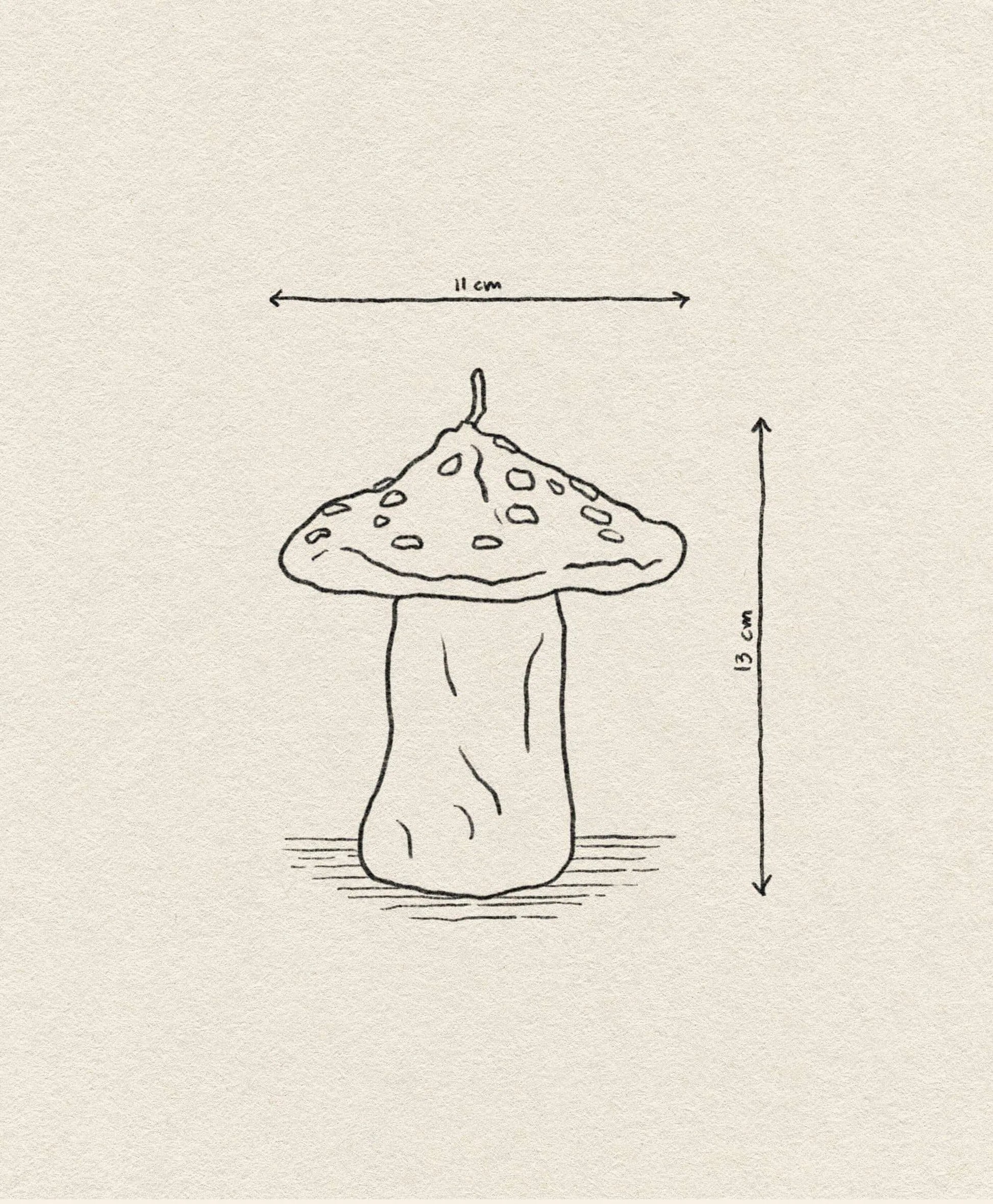 A simple line drawing of the &klevering Dots Mushroom Candle by &klevering, featuring a wide cap (11 cm) and tall stem (13 cm), with arrows marking dimensions on a plain textured paper background.