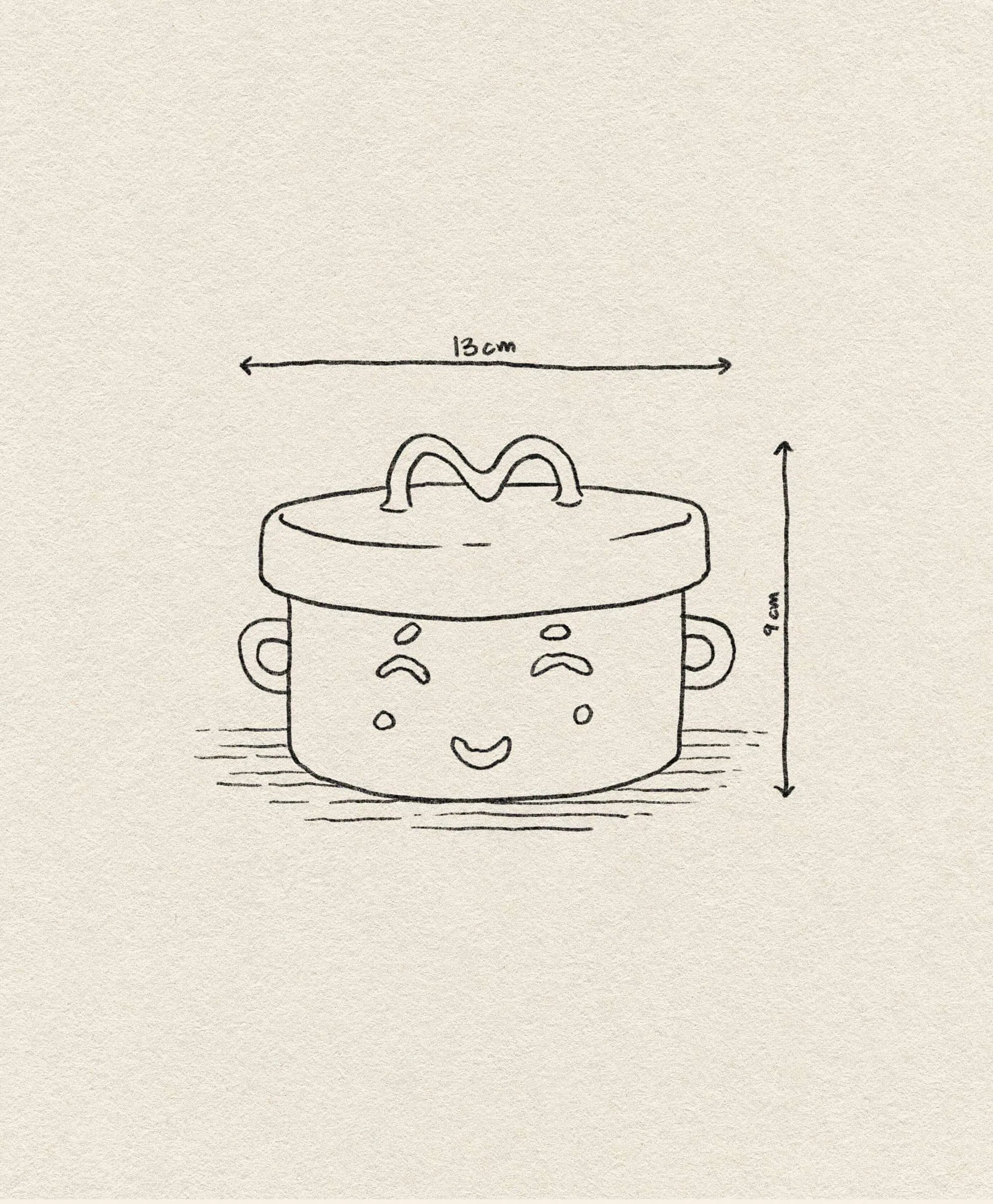 A line drawing of the &klevering Happy Jar by &klevering, showing its playful design with a smiling face, ears, and handled lid. Arrows indicate its 13 cm width and 9 cm height against a light beige textured background.