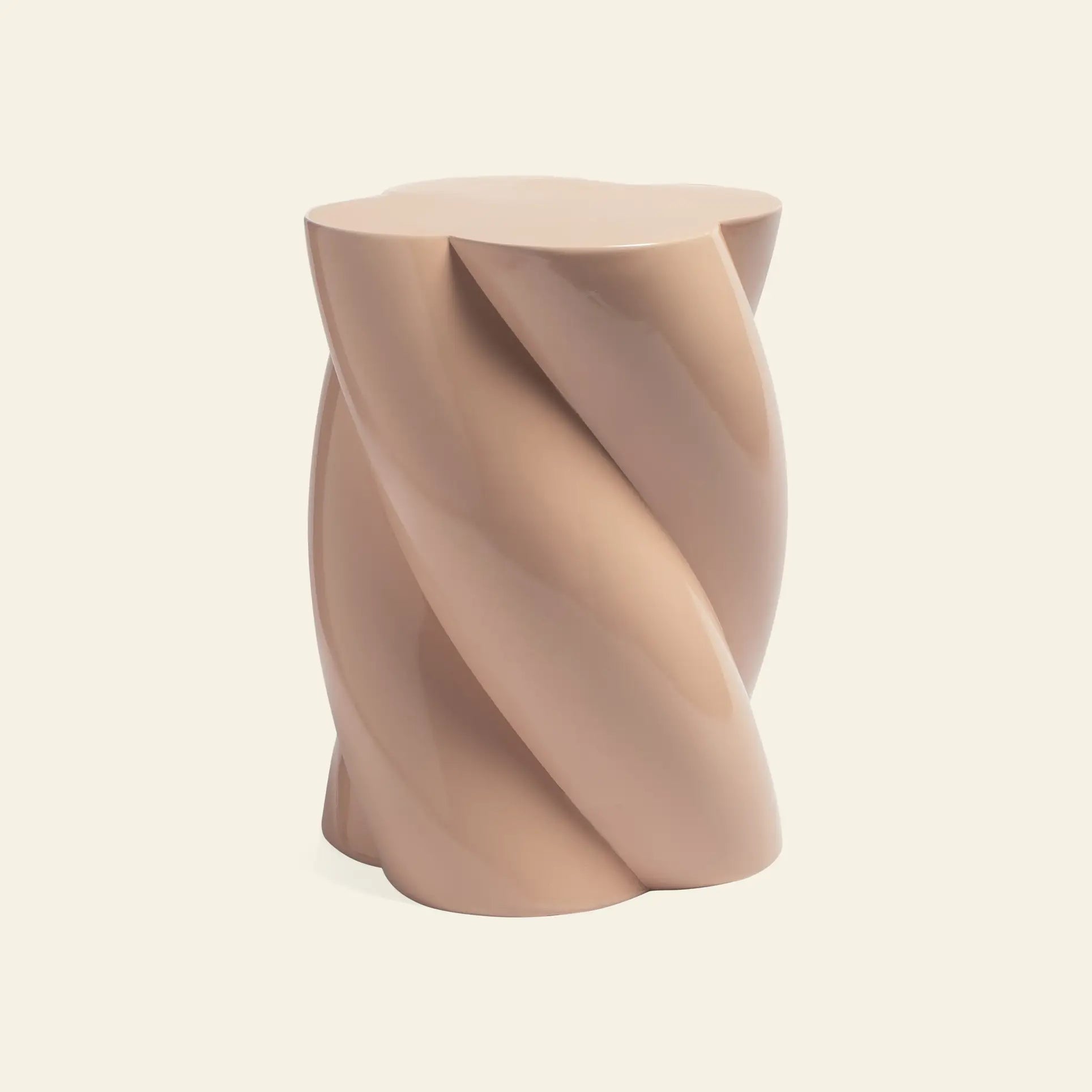 The &klevering Marshmallow Pillar by &klevering is a modern, sculptural stool or side table in smooth beige with a whimsical twisted spiral design, inspired by marshmallow pillars, set against an off-white background.