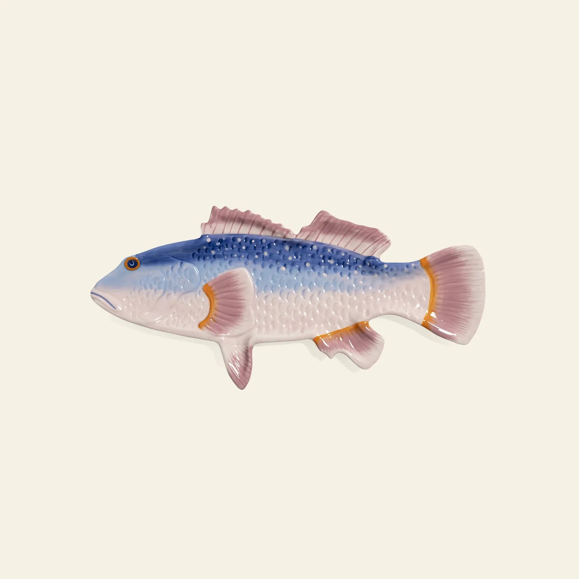 The &klevering Perch Fish Plate by &klevering is a hand-painted ceramic serving dish with blue, pink, and white hues, textured scales, and detailed fins, shaped like a decorative perch fish against a plain light background.